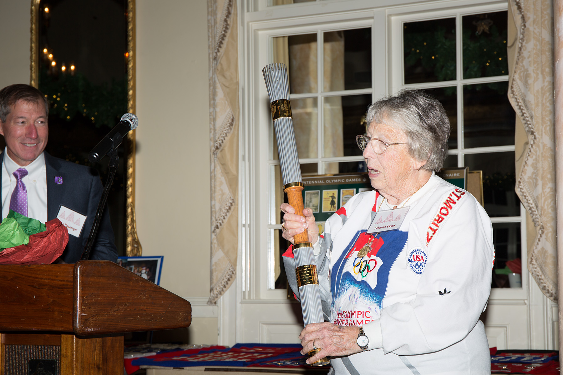  Sharon Evers, our Olympic presenter, with the torch that she carried in 1996. 