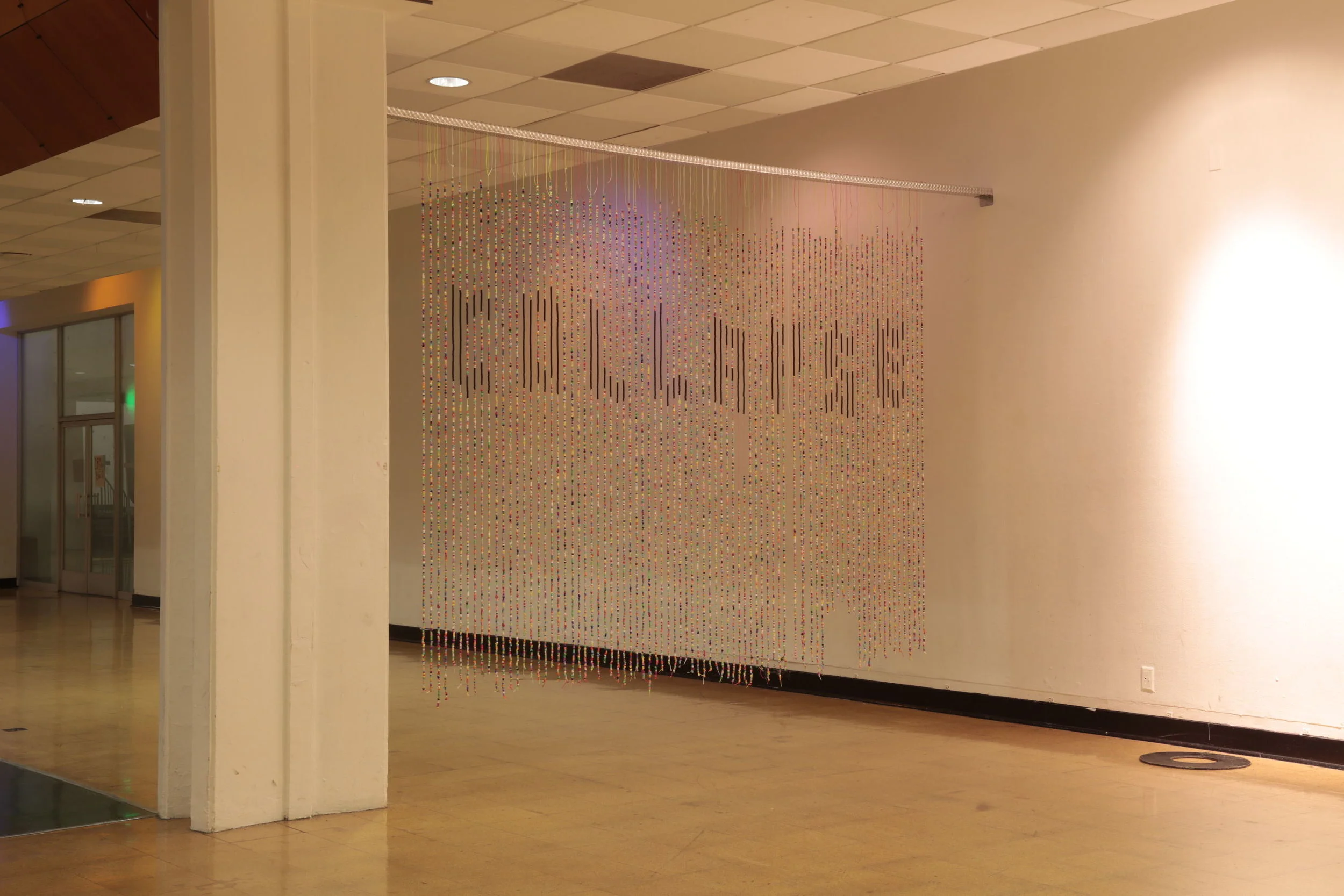 Total Collapse (2013) rave beads and twine, 14 x 8 ft