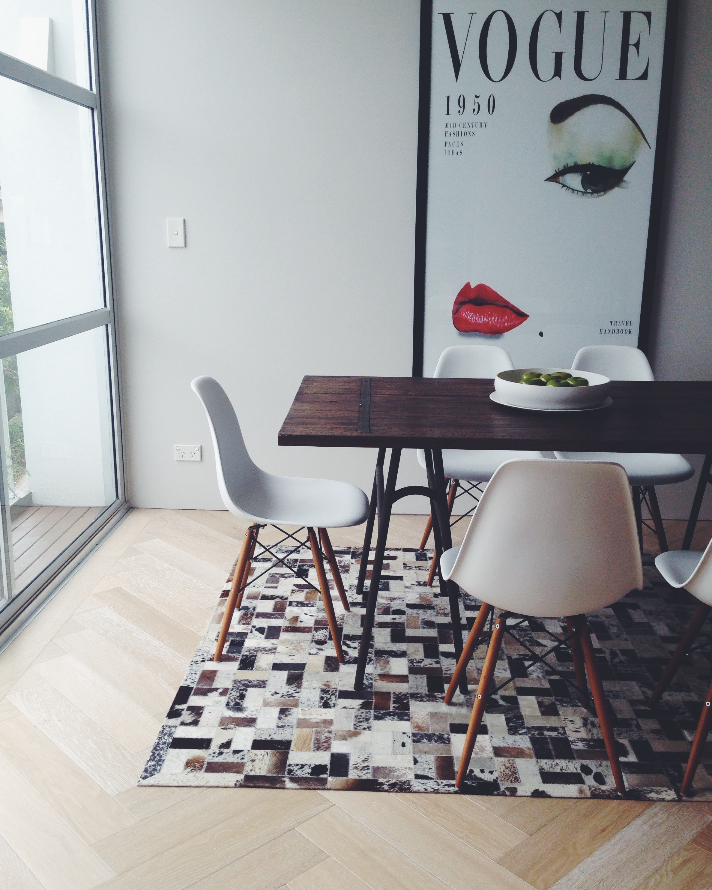The dining room in Emily's home. She has recently added that amazing herringbone floor.