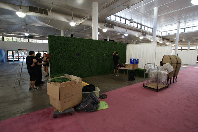 Booth backdrop up and ready for product and styling