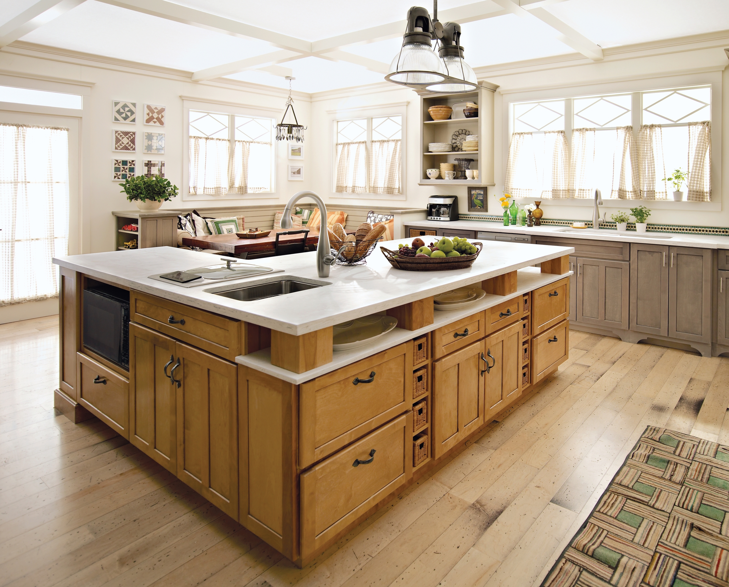 A country inspired design with an open kitchen floorplan and large island