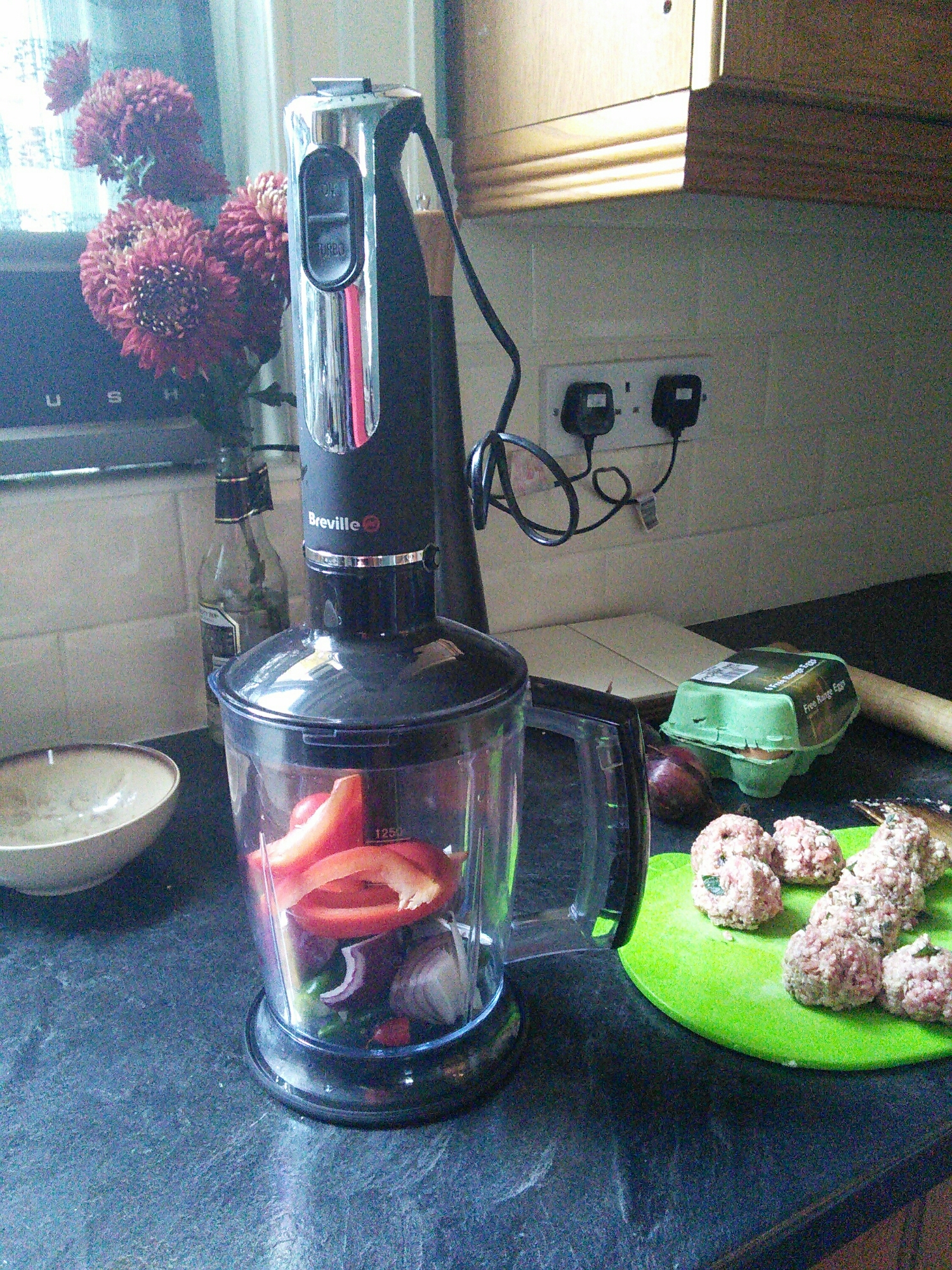 Harissa time - Chop the chilli's, red onion and pepper with herbs and ground spices