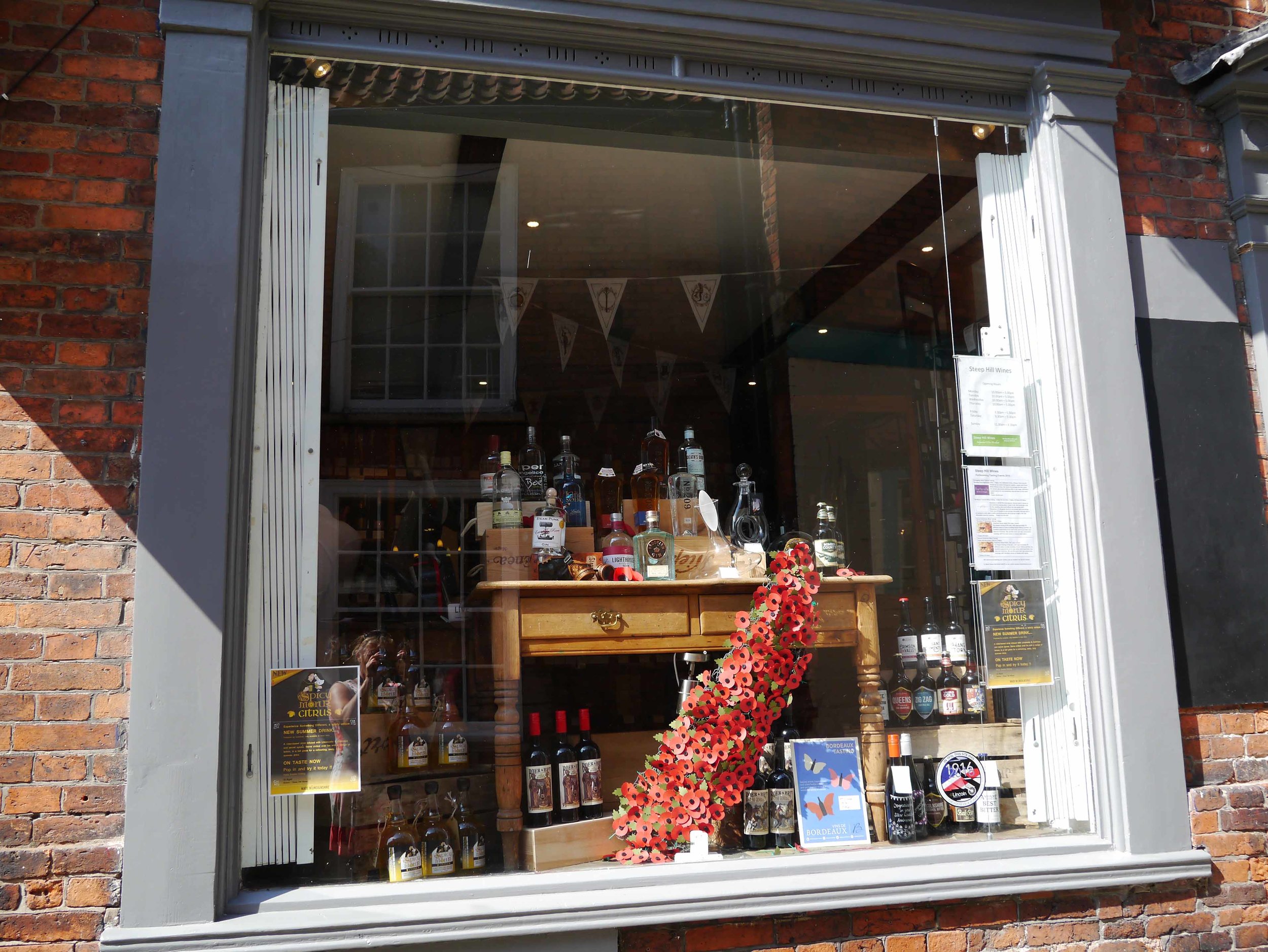 Lincoln Steep Street shop with poppy display