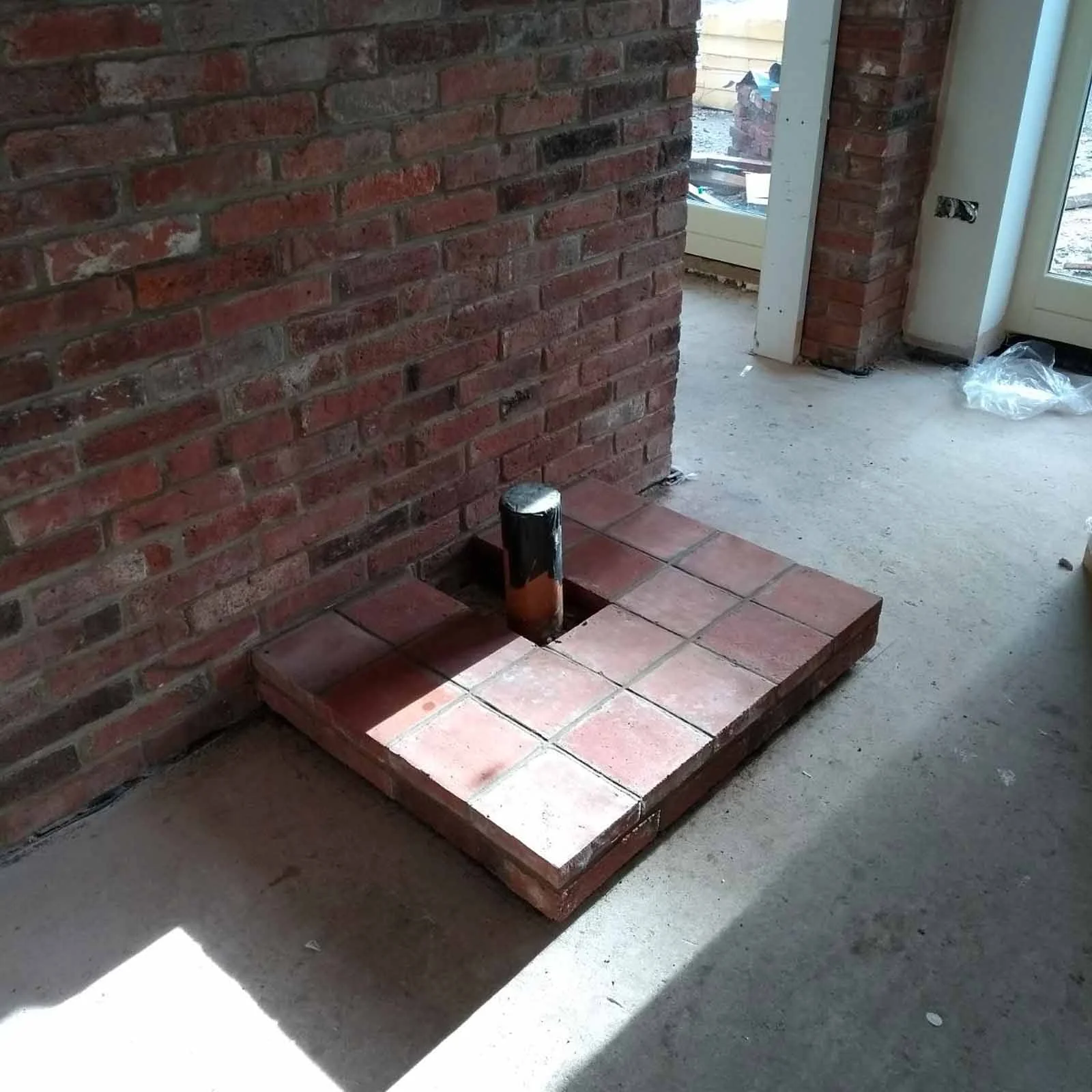 Reclaimed brick and quarry tile hearth