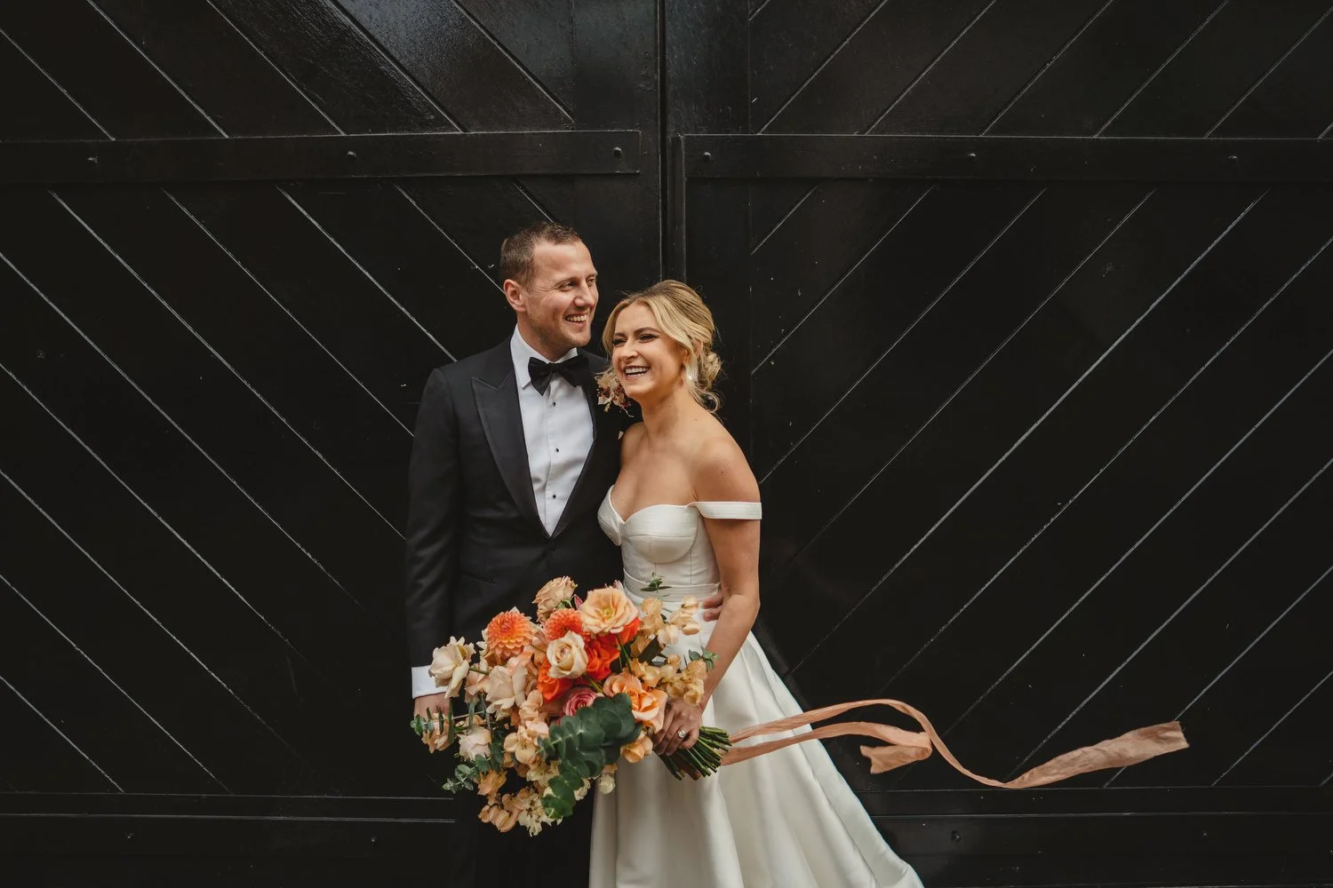  Jack McGarry and Katie Marino’s Wedding in Larchfield, Lisburn with Photographs in Belfast’s Cathedral Quarter, The Duke of York and the Merchant Hotel. Katie wore a gorgeous dress by Karen Willis Holmes, while Jack dressed in a black tie. Flowers w