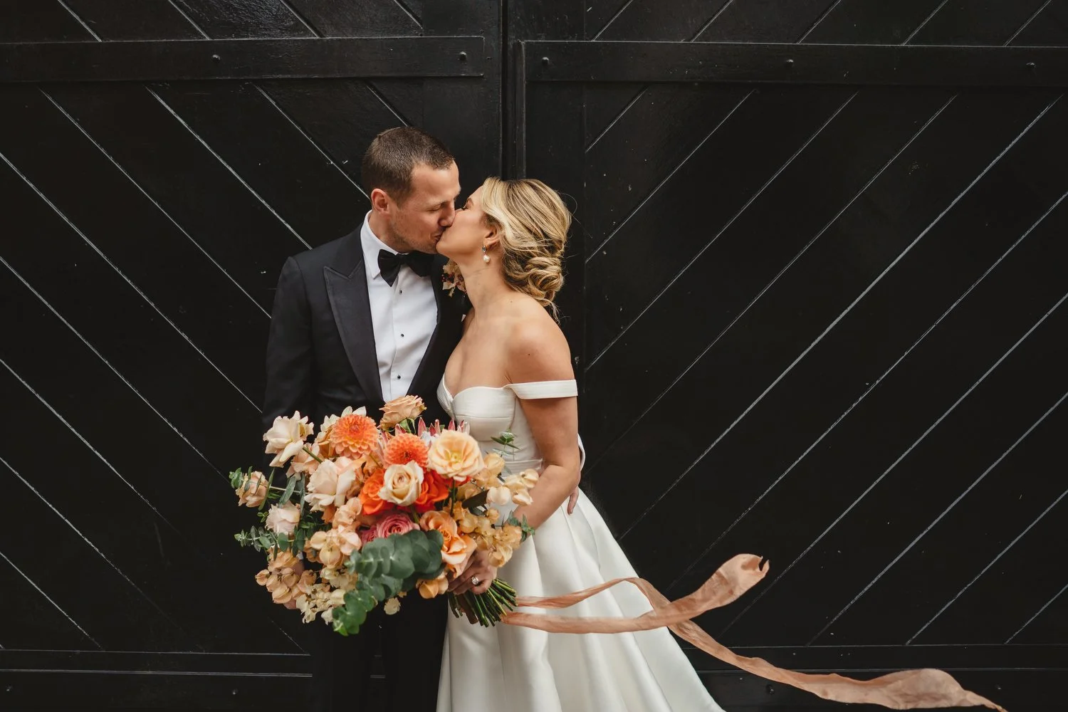  Jack McGarry and Katie Marino’s Wedding in Larchfield, Lisburn with Photographs in Belfast’s Cathedral Quarter, The Duke of York and the Merchant Hotel. Katie wore a gorgeous dress by Karen Willis Holmes, while Jack dressed in a black tie. Flowers w