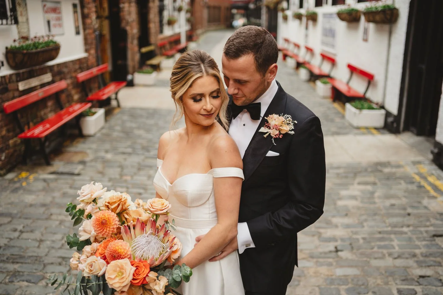  Jack McGarry and Katie Marino’s Wedding in Larchfield, Lisburn with Photographs in Belfast’s Cathedral Quarter, The Duke of York and the Merchant Hotel. Katie wore a gorgeous dress by Karen Willis Holmes, while Jack dressed in a black tie. Flowers w