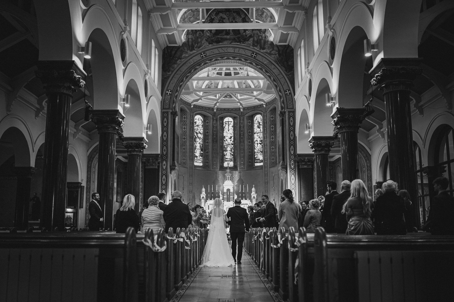  Jack McGarry and Katie Marino’s Wedding in Larchfield, Lisburn with Photographs in Belfast’s Cathedral Quarter, The Duke of York and the Merchant Hotel. Katie wore a gorgeous dress by Karen Willis Holmes, while Jack dressed in a black tie. Flowers w