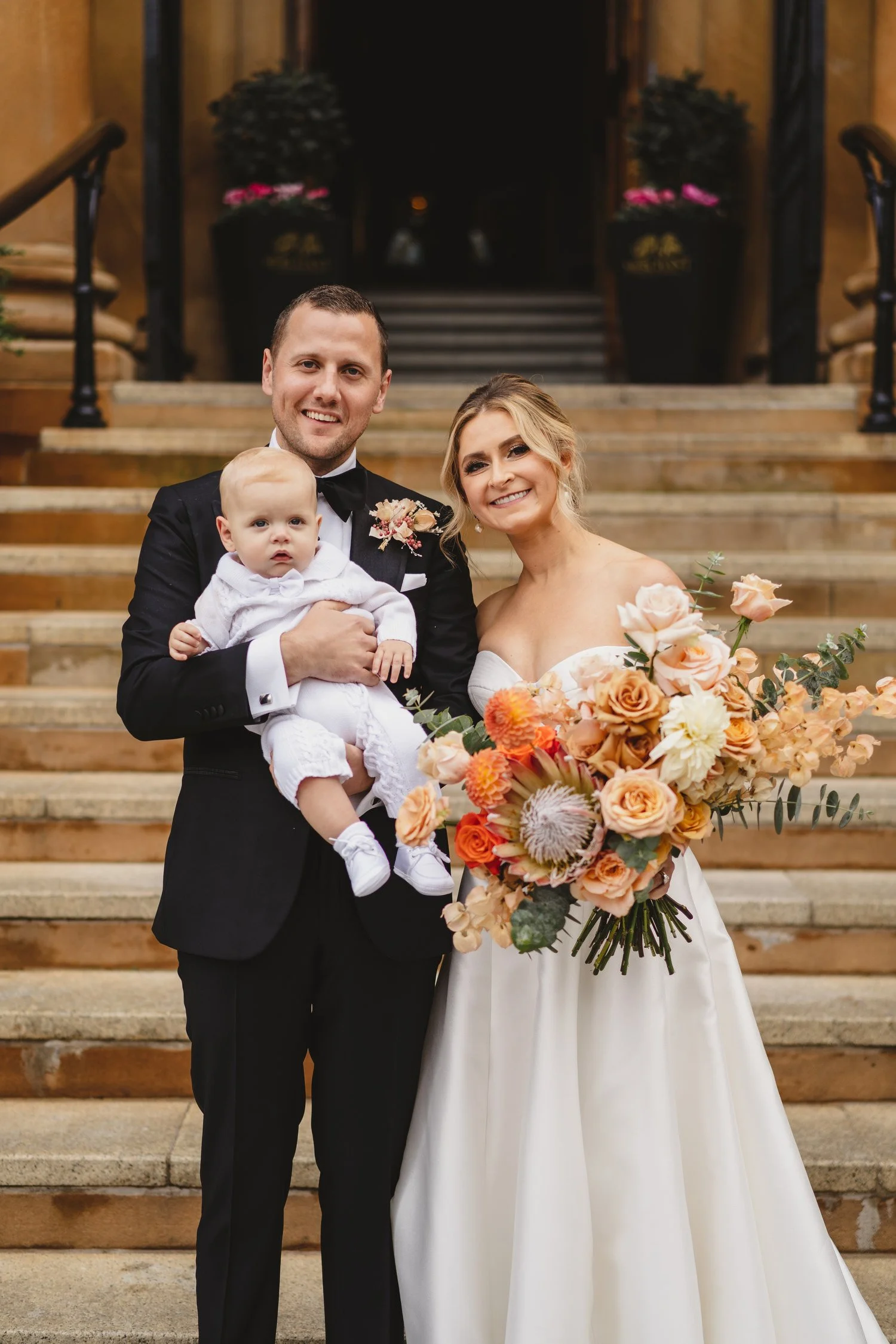  Jack McGarry and Katie Marino’s Wedding in Larchfield, Lisburn with Photographs in Belfast’s Cathedral Quarter, The Duke of York and the Merchant Hotel. Katie wore a gorgeous dress by Karen Willis Holmes, while Jack dressed in a black tie. Flowers w