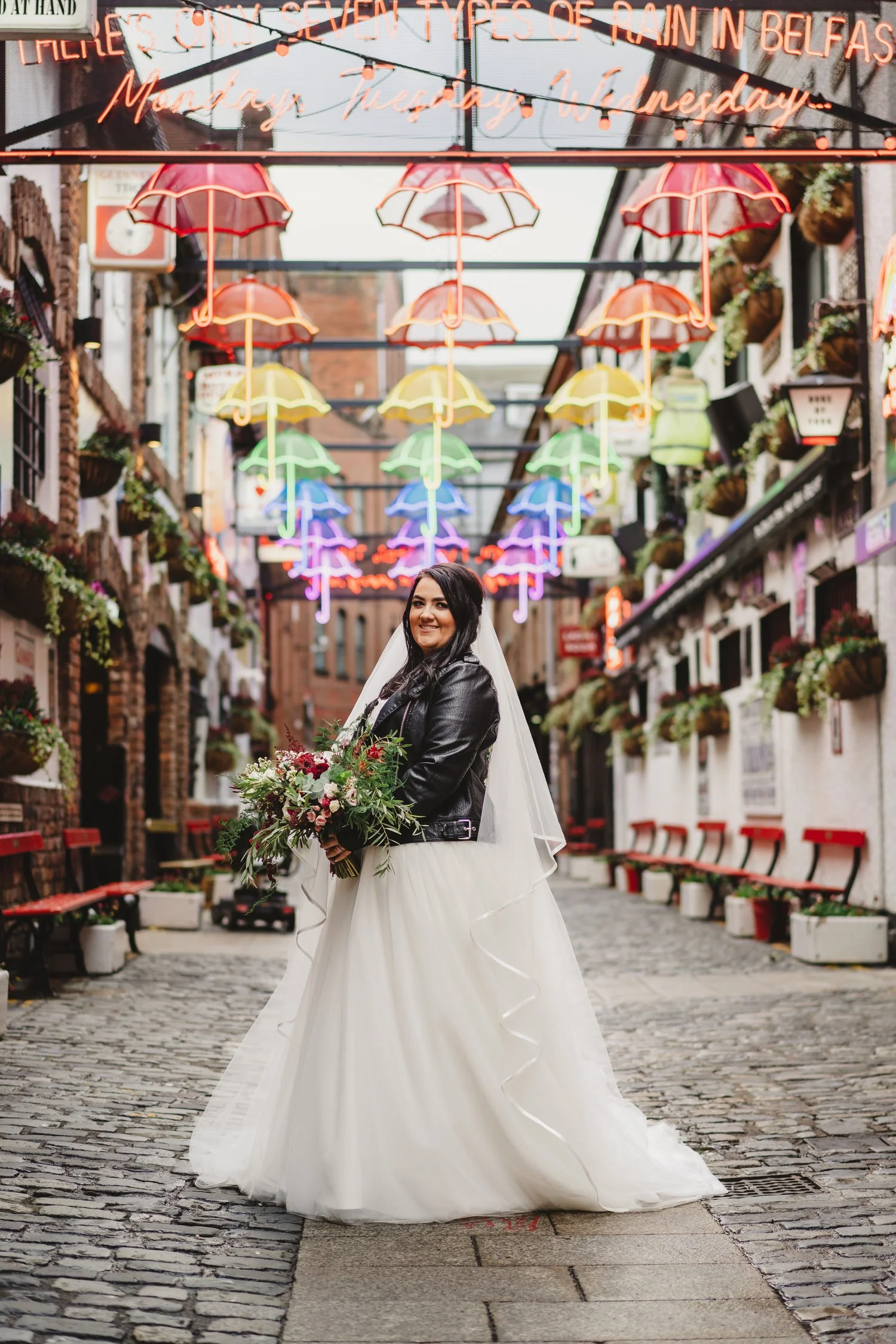  Aimee and Stephen’s humanist wedding at Titanic Hotel, Belfast with photos taken in Belfast Cathedral Quarter with avintage camper and VW beetle. 