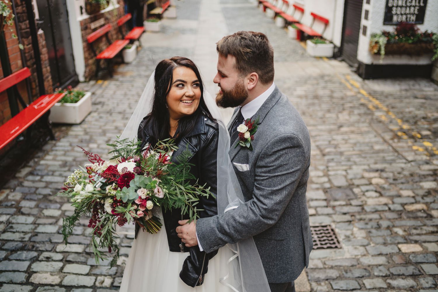  Aimee and Stephen’s humanist wedding at Titanic Hotel, Belfast with photos taken in Belfast Cathedral Quarter with avintage camper and VW beetle. 
