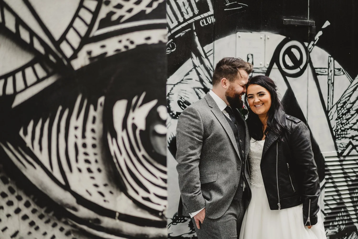  Aimee and Stephen’s humanist wedding at Titanic Hotel, Belfast with photos taken in Belfast Cathedral Quarter with avintage camper and VW beetle. 