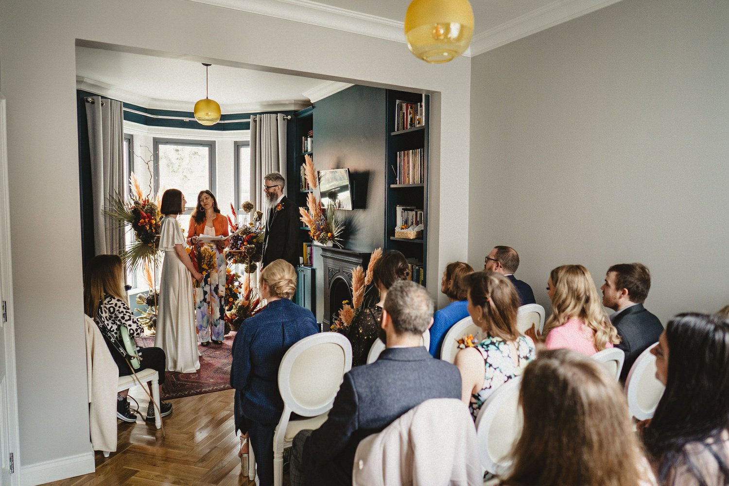  Kathryn and ChrisÕs wedding was supposed to be in Babel rooftop but it burned down 4 days before they were due to get married.  Instead they had their humanist wedding in their own house followed by photos in nearby Ormeau Park and Belfast Cathedral