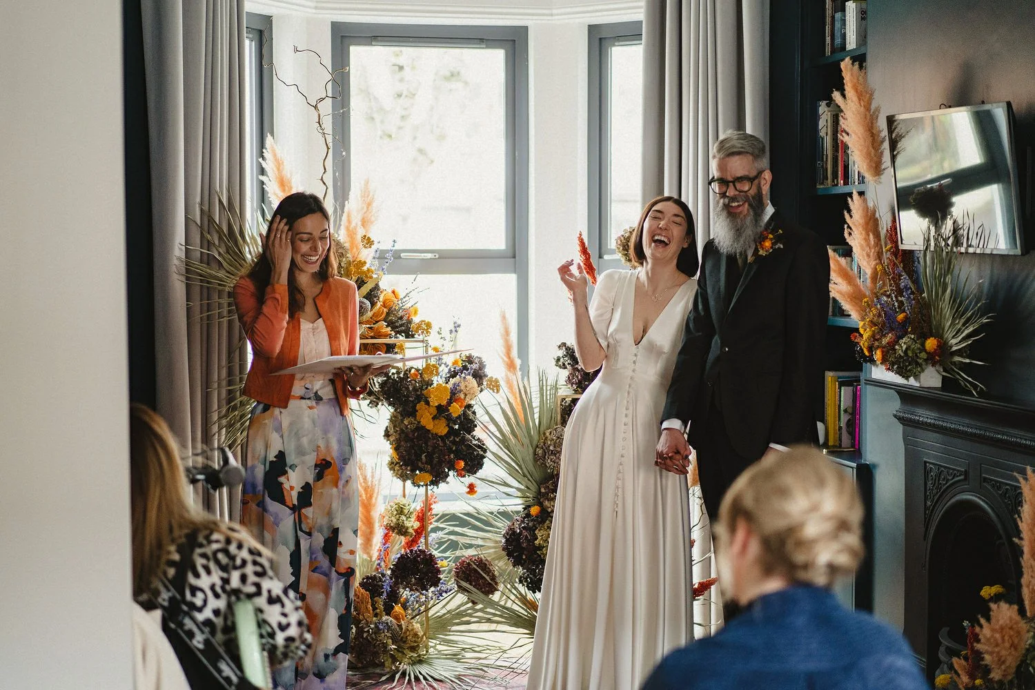  Kathryn and ChrisÕs wedding was supposed to be in Babel rooftop but it burned down 4 days before they were due to get married.  Instead they had their humanist wedding in their own house followed by photos in nearby Ormeau Park and Belfast Cathedral