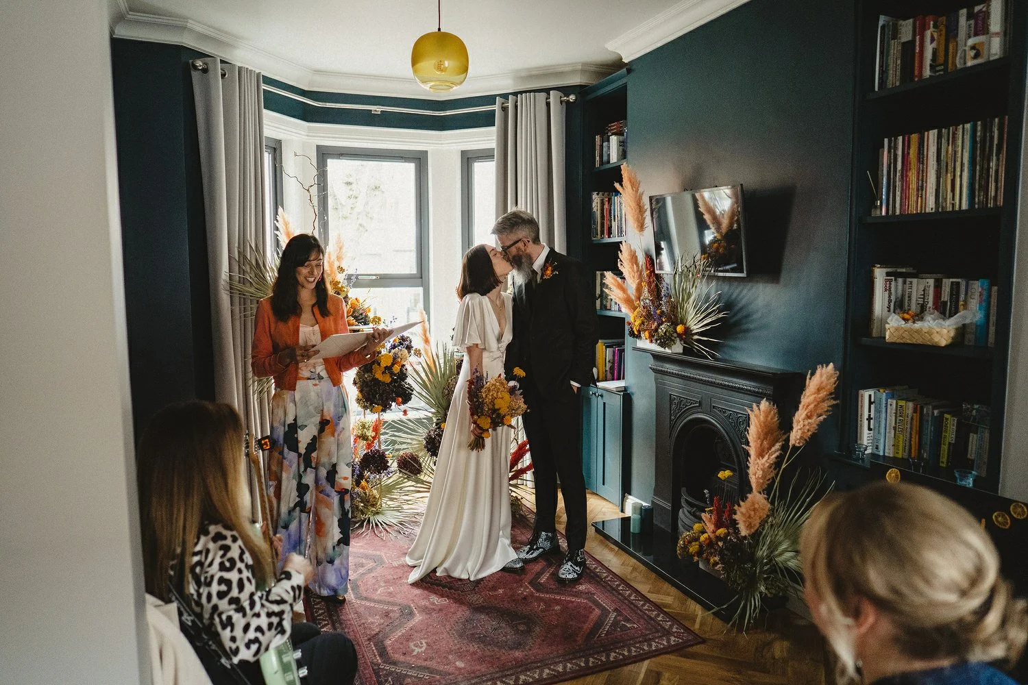  Kathryn and ChrisÕs wedding was supposed to be in Babel rooftop but it burned down 4 days before they were due to get married.  Instead they had their humanist wedding in their own house followed by photos in nearby Ormeau Park and Belfast Cathedral