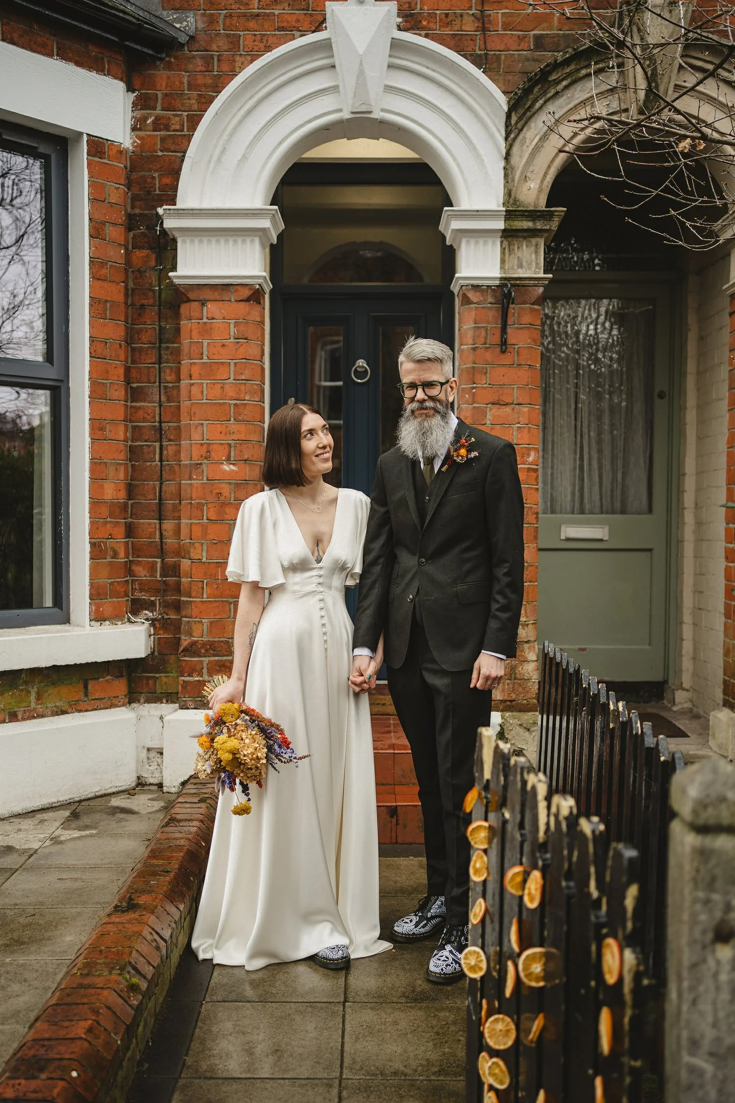  Kathryn and ChrisÕs wedding was supposed to be in Babel rooftop but it burned down 4 days before they were due to get married.  Instead they had their humanist wedding in their own house followed by photos in nearby Ormeau Park and Belfast Cathedral