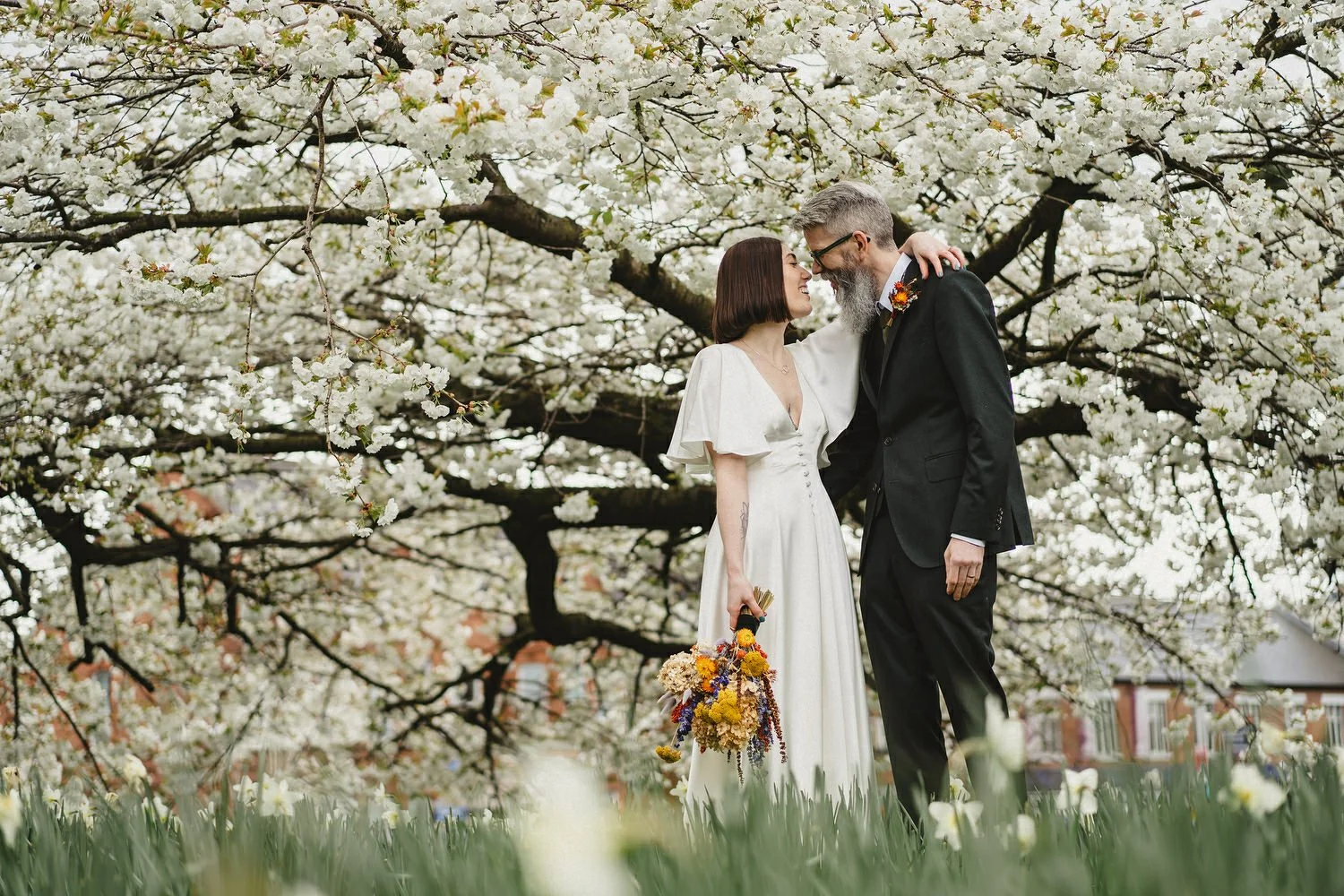  Kathryn and ChrisÕs wedding was supposed to be in Babel rooftop but it burned down 4 days before they were due to get married.  Instead they had their humanist wedding in their own house followed by photos in nearby Ormeau Park and Belfast Cathedral