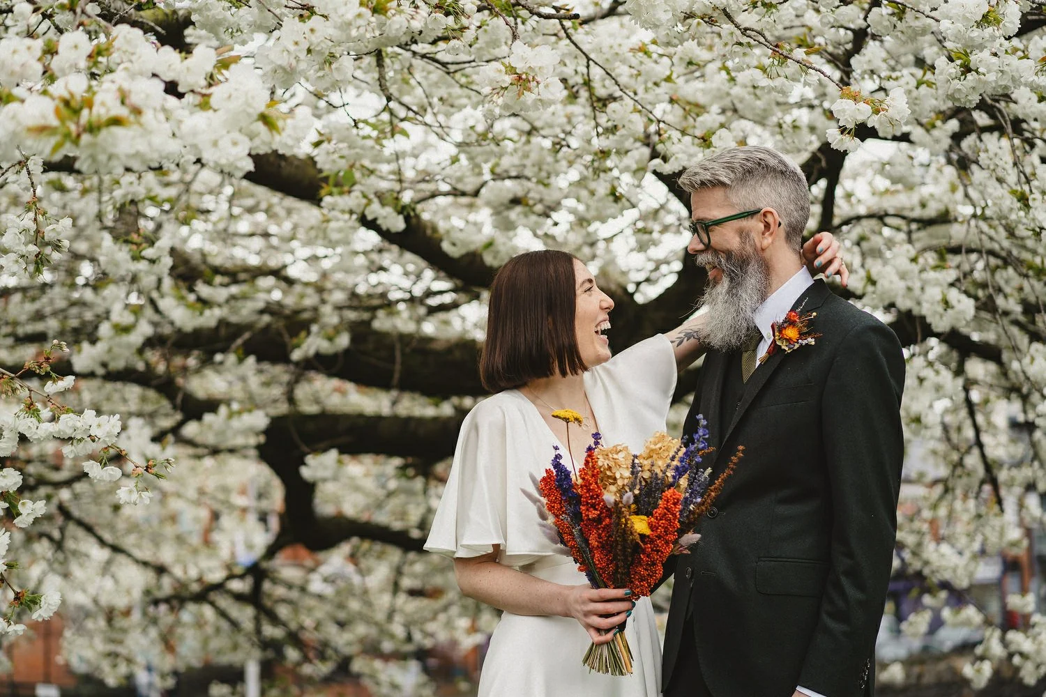  Kathryn and ChrisÕs wedding was supposed to be in Babel rooftop but it burned down 4 days before they were due to get married.  Instead they had their humanist wedding in their own house followed by photos in nearby Ormeau Park and Belfast Cathedral