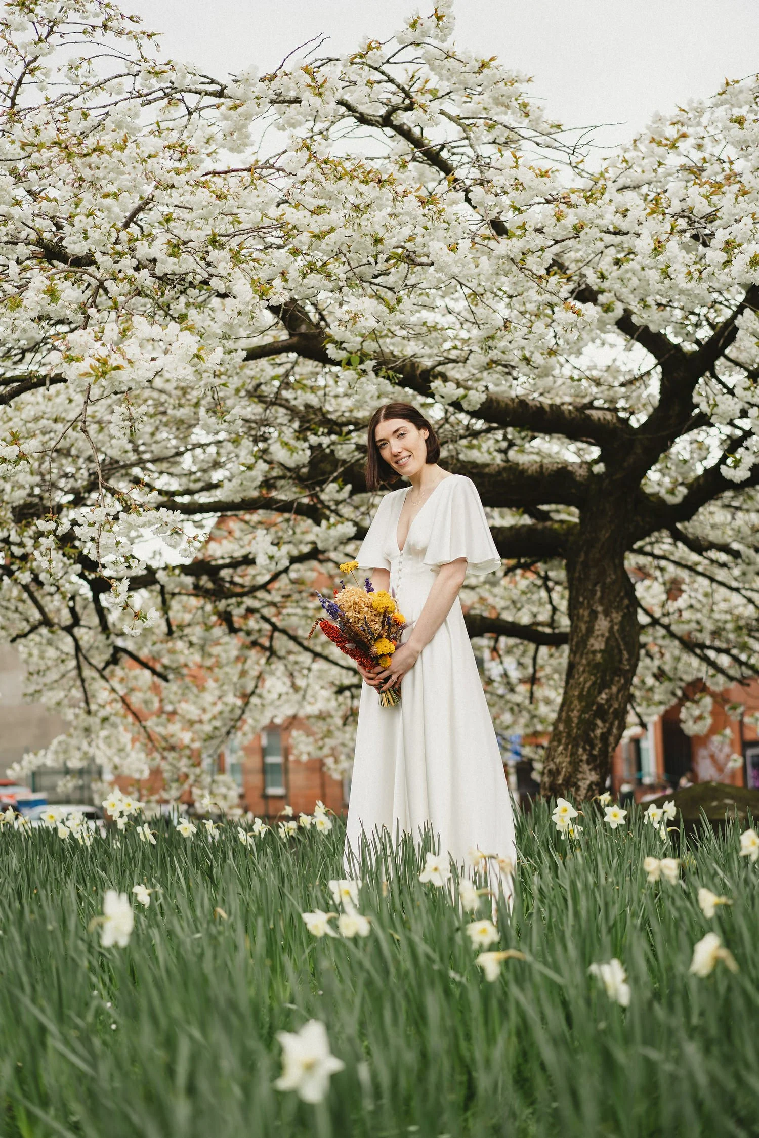  Kathryn and ChrisÕs wedding was supposed to be in Babel rooftop but it burned down 4 days before they were due to get married.  Instead they had their humanist wedding in their own house followed by photos in nearby Ormeau Park and Belfast Cathedral