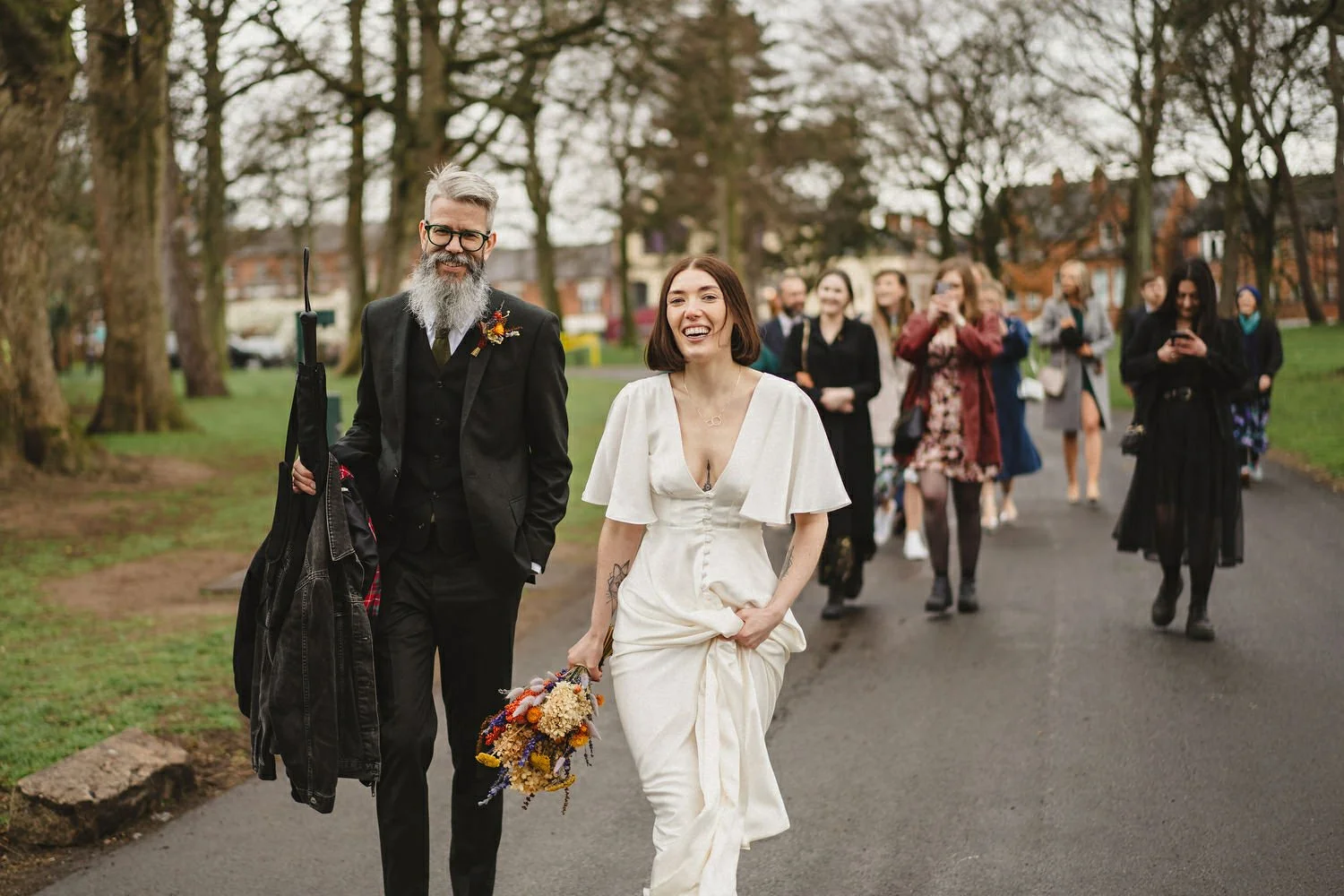  Kathryn and ChrisÕs wedding was supposed to be in Babel rooftop but it burned down 4 days before they were due to get married.  Instead they had their humanist wedding in their own house followed by photos in nearby Ormeau Park and Belfast Cathedral