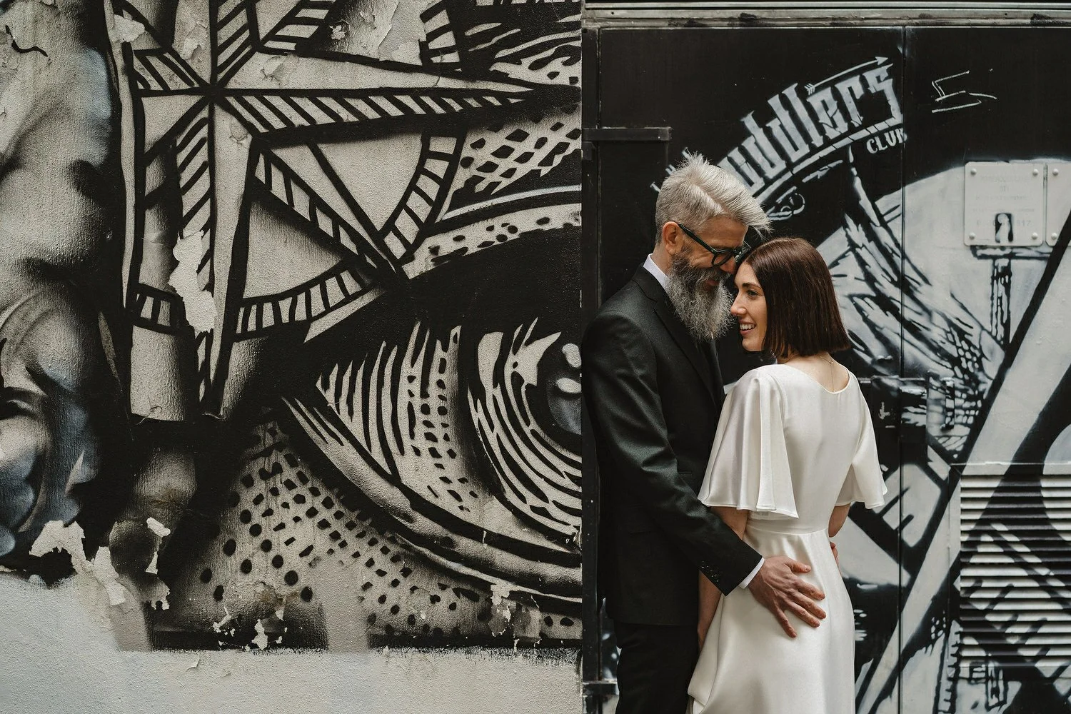  Kathryn and ChrisÕs wedding was supposed to be in Babel rooftop but it burned down 4 days before they were due to get married.  Instead they had their humanist wedding in their own house followed by photos in nearby Ormeau Park and Belfast Cathedral