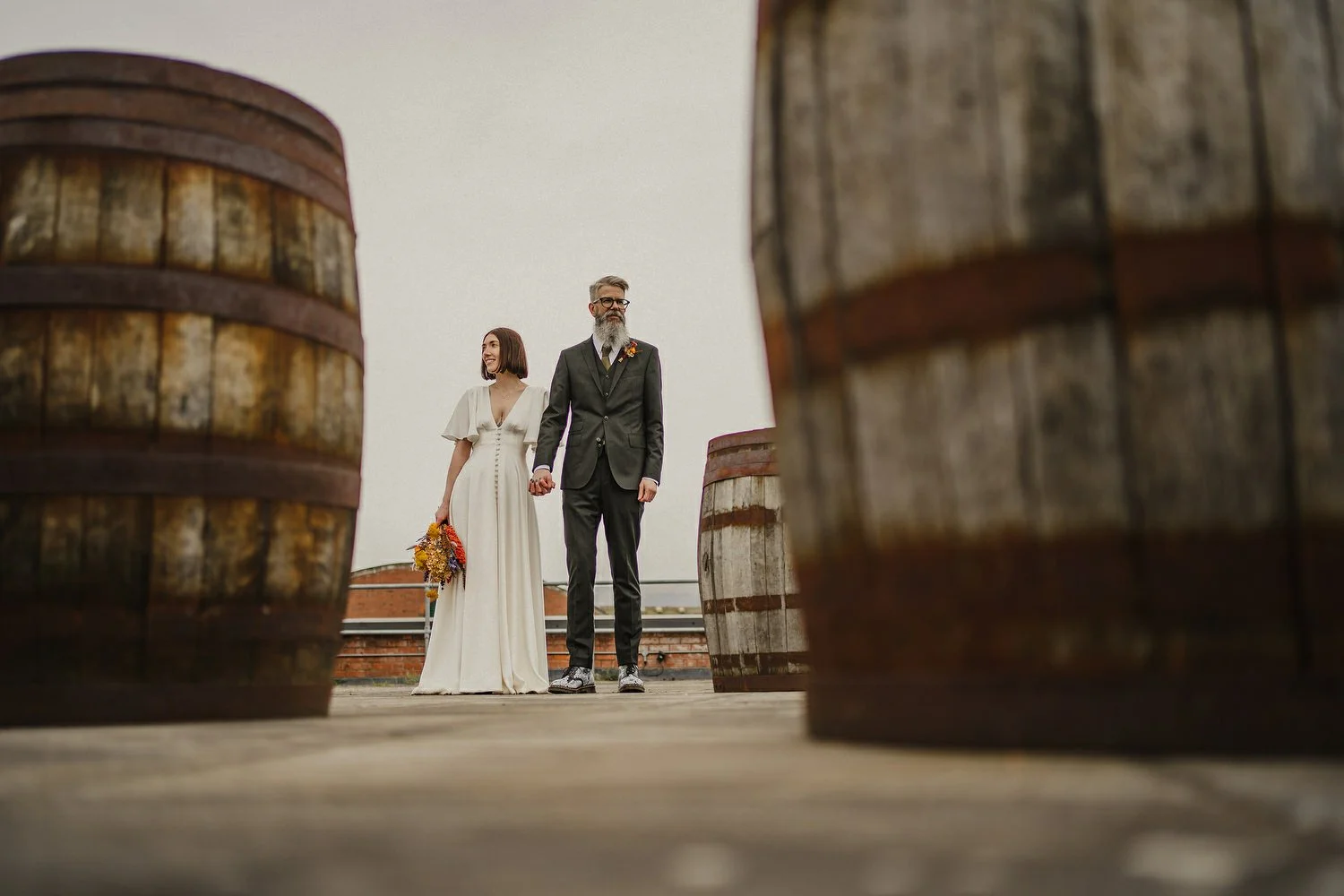  Kathryn and ChrisÕs wedding was supposed to be in Babel rooftop but it burned down 4 days before they were due to get married.  Instead they had their humanist wedding in their own house followed by photos in nearby Ormeau Park and Belfast Cathedral