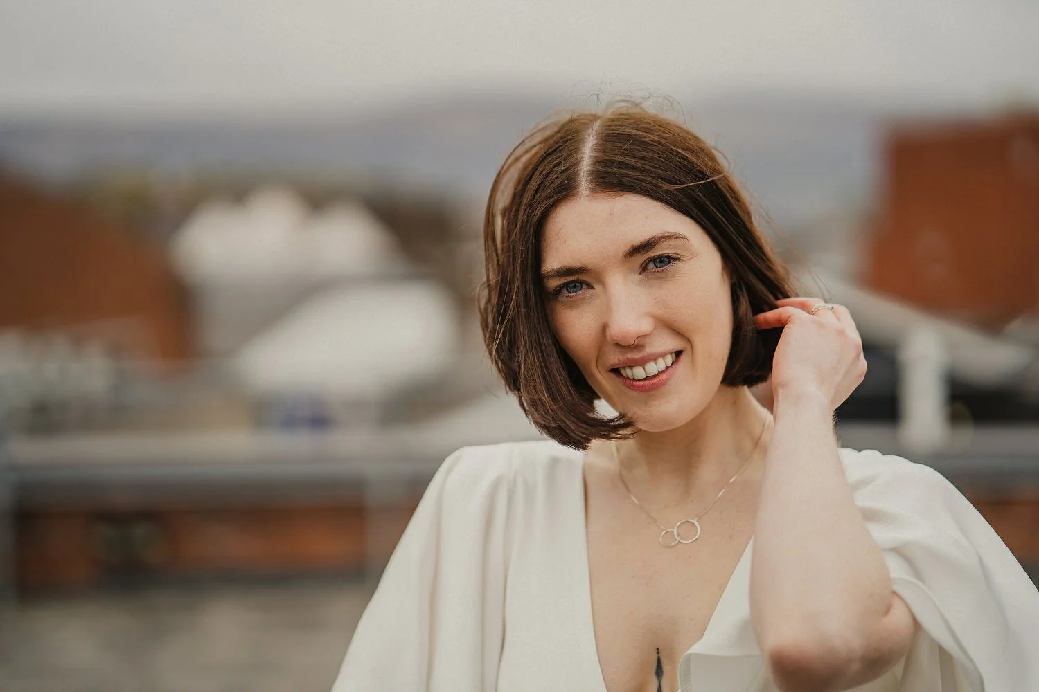  Kathryn and ChrisÕs wedding was supposed to be in Babel rooftop but it burned down 4 days before they were due to get married.  Instead they had their humanist wedding in their own house followed by photos in nearby Ormeau Park and Belfast Cathedral