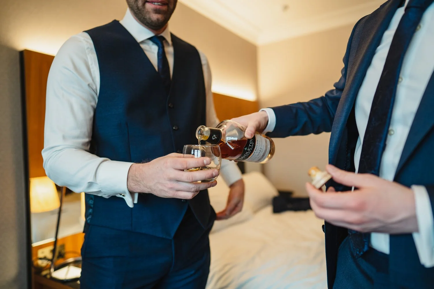  Laura and Matthews wedding in the Muddler’s Club restaurant in Belfast’s Cathedral Quarter. The couple got ready in the Hilton hotel before heading to St.Malachy’s church for their ceremony. Afterwards, we took photos around Cathedral Quarter before