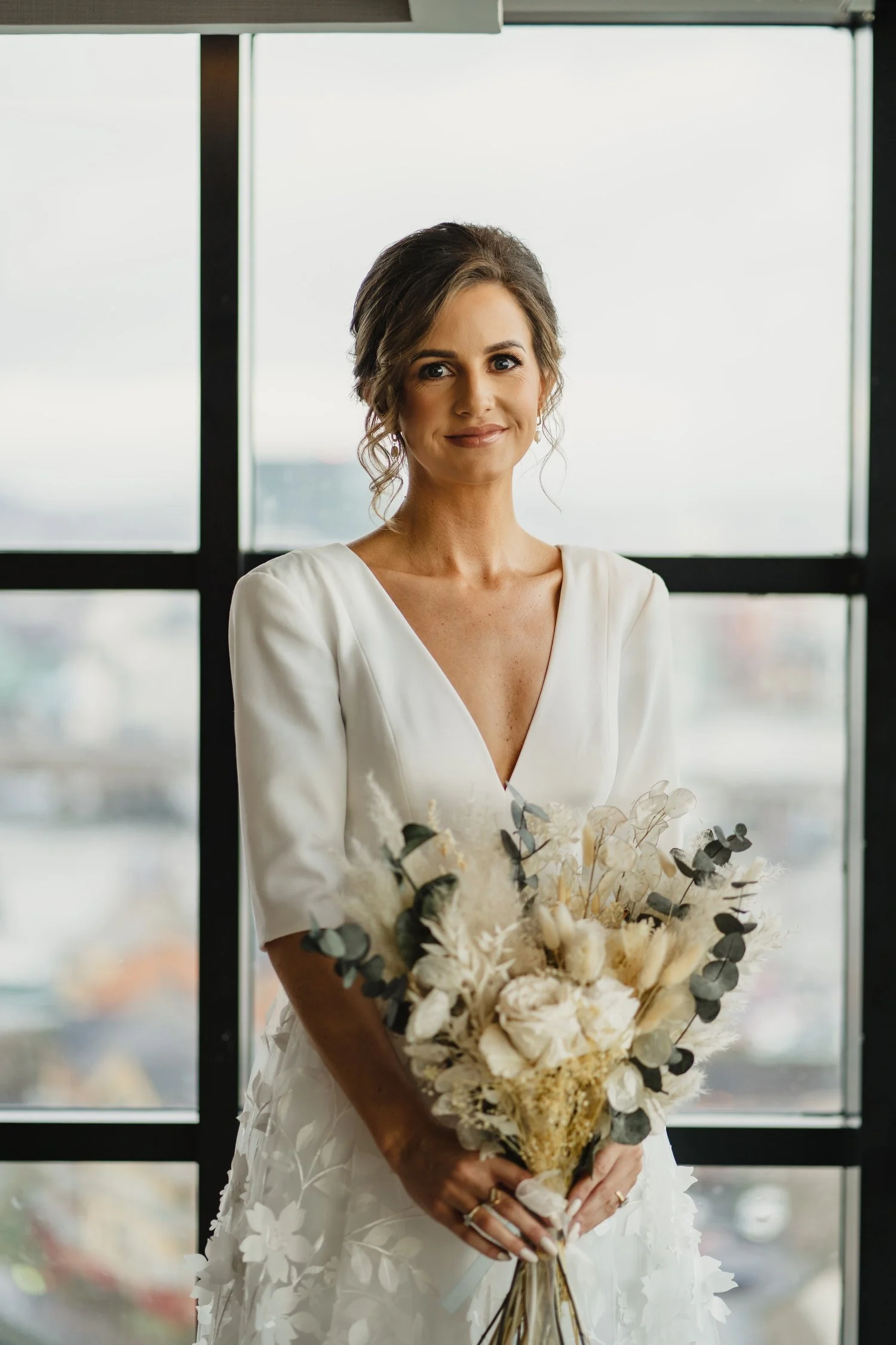  Laura and Matthews wedding in the Muddler’s Club restaurant in Belfast’s Cathedral Quarter. The couple got ready in the Hilton hotel before heading to St.Malachy’s church for their ceremony. Afterwards, we took photos around Cathedral Quarter before