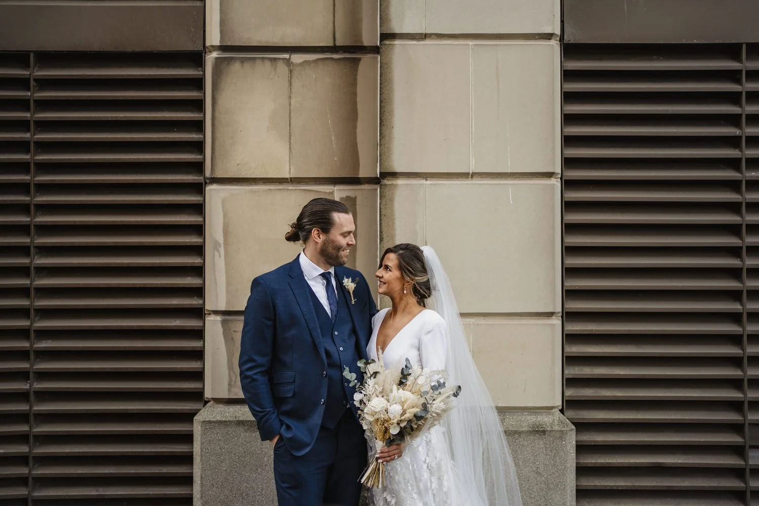 Laura and Matthews wedding in the Muddler’s Club restaurant in Belfast’s Cathedral Quarter. The couple got ready in the Hilton hotel before heading to St.Malachy’s church for their ceremony. Afterwards, we took photos around Cathedral Quarter before