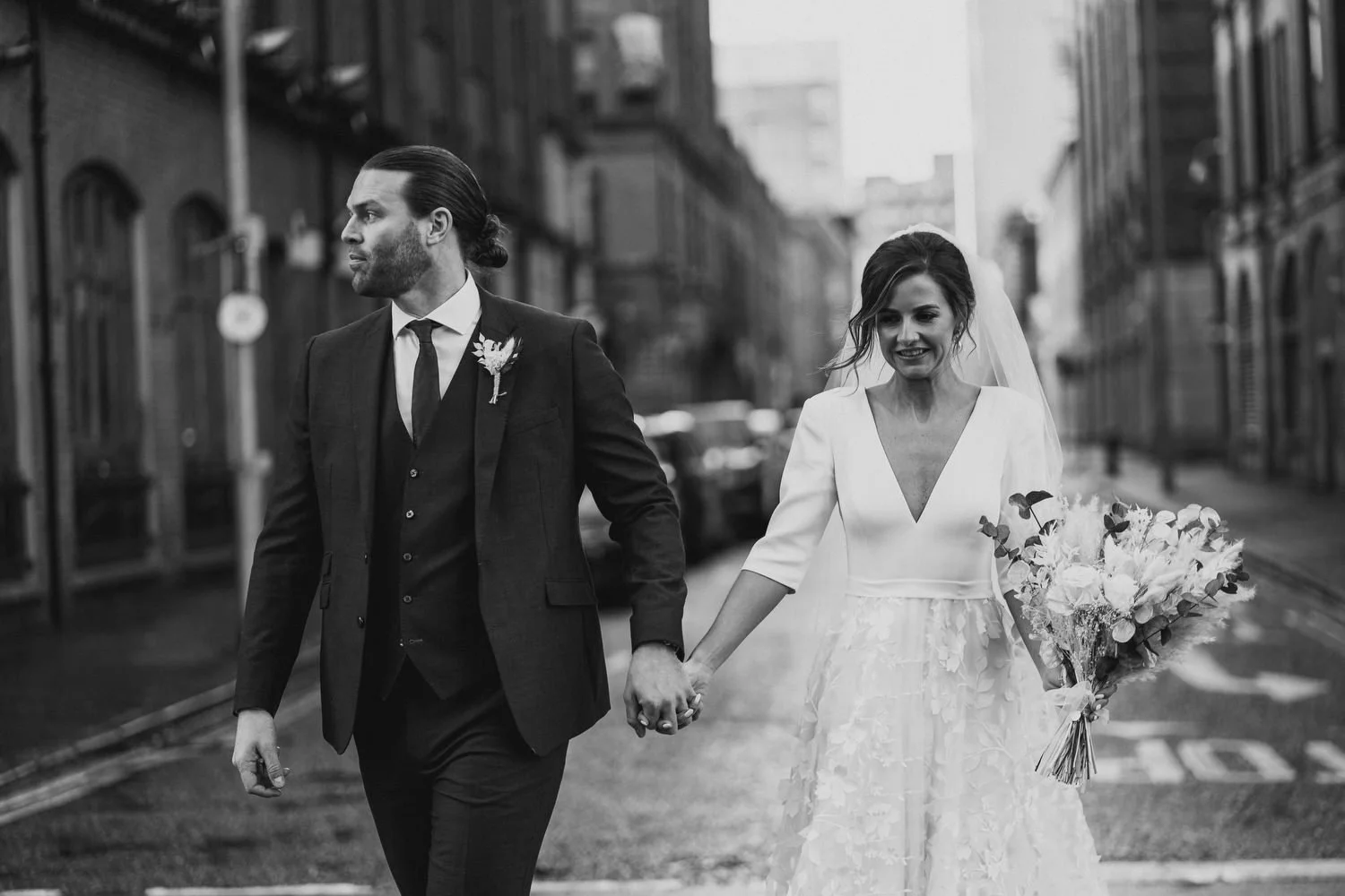  Laura and Matthews wedding in the Muddler’s Club restaurant in Belfast’s Cathedral Quarter. The couple got ready in the Hilton hotel before heading to St.Malachy’s church for their ceremony. Afterwards, we took photos around Cathedral Quarter before