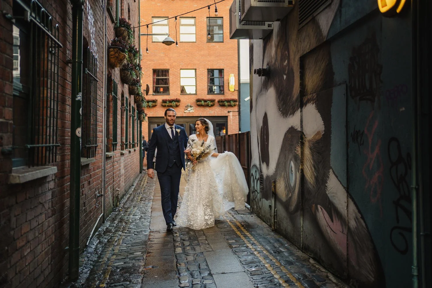  Laura and Matthews wedding in the Muddler’s Club restaurant in Belfast’s Cathedral Quarter. The couple got ready in the Hilton hotel before heading to St.Malachy’s church for their ceremony. Afterwards, we took photos around Cathedral Quarter before