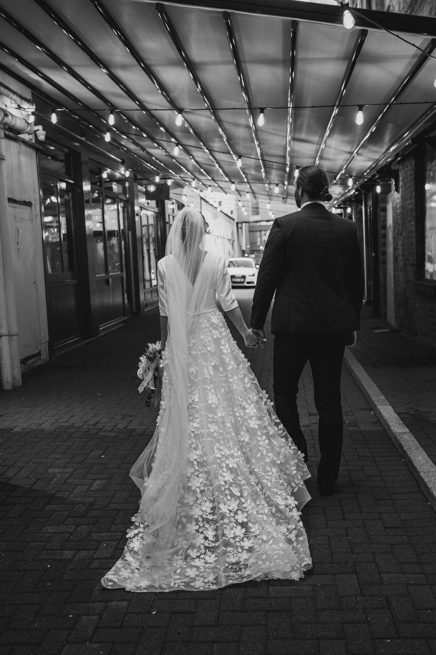  Laura and Matthews wedding in the Muddler’s Club restaurant in Belfast’s Cathedral Quarter. The couple got ready in the Hilton hotel before heading to St.Malachy’s church for their ceremony. Afterwards, we took photos around Cathedral Quarter before
