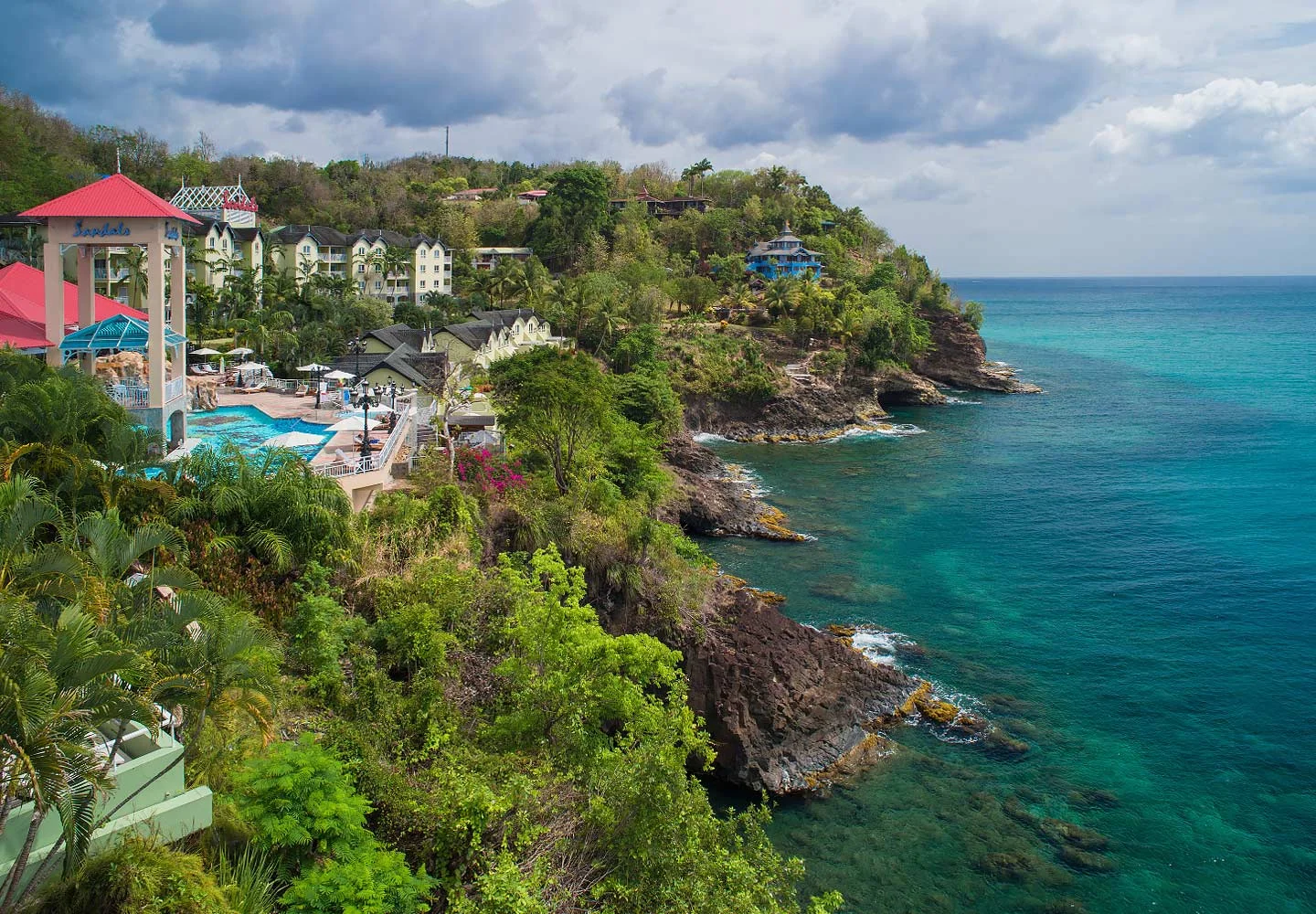 The stately palms that grace the mile-long entrance into the legendary La Toc Estate and Golf Resort are the awe-inspiring prelude to your Saint Lucia vacation at the Caribbean's Most Glamorous Resort. Sandals Regency La Toc is recognized as the most sparkling jewel in the islands. The "Emerald of the Caribbean" glitters invitingly along the half-mile crescent shaped beach, cradling exotic coral bluffs, lush hillsides, and rolling fairways. This magnificent 210-acre estate features Sunset Bluff Village, a resort within the resort, flaunting breathtaking vistas from bluff-top villas with private intimate pools. Indulge in Five-Star Diamond French cuisine and other tantalizing cuisine from around the world at nine spectacular restaurants.
