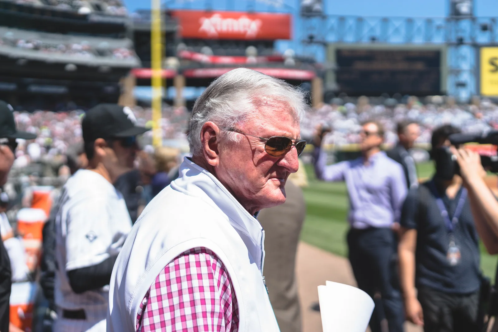 TV announcer "Hawk" Harrelson preparing for emcee duties.
