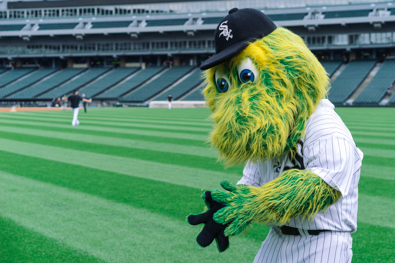 Southpaw plays catch with an invisible ball.