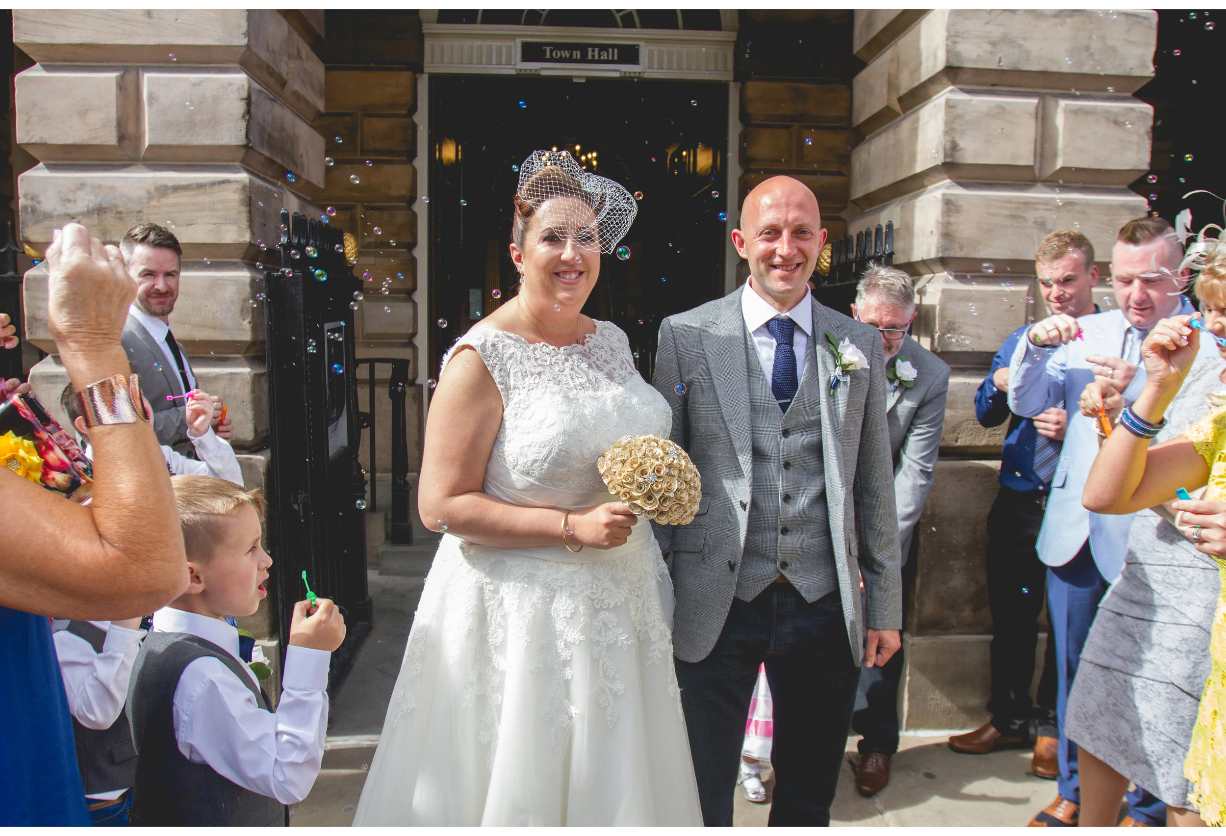 wedding bubbles outside town hall in liverpool city center