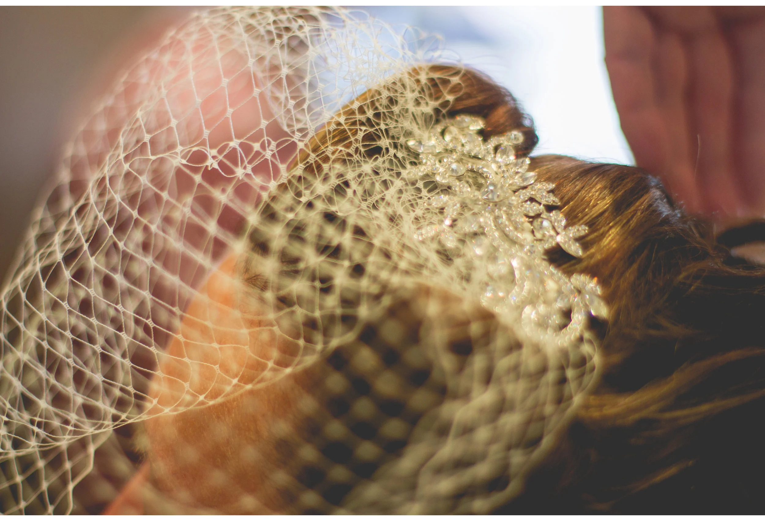 brides birdcage veil close details wedding hair