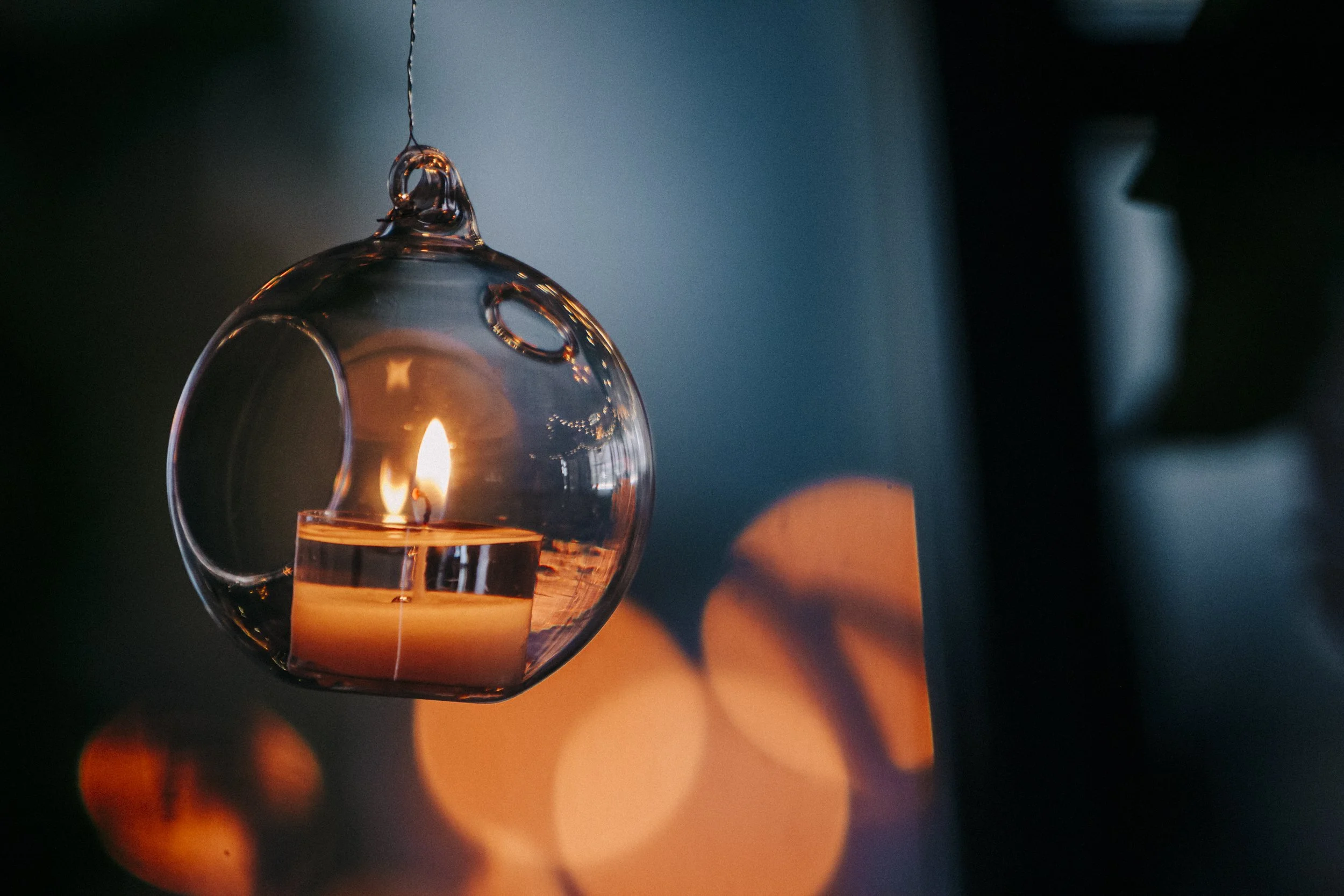 Romantic Ambiance: Hanging Candle Details at Titanic Hotel Liverpool Wedding, Adding a Touch of Enchanting Warmth and Elegance to the Venue.