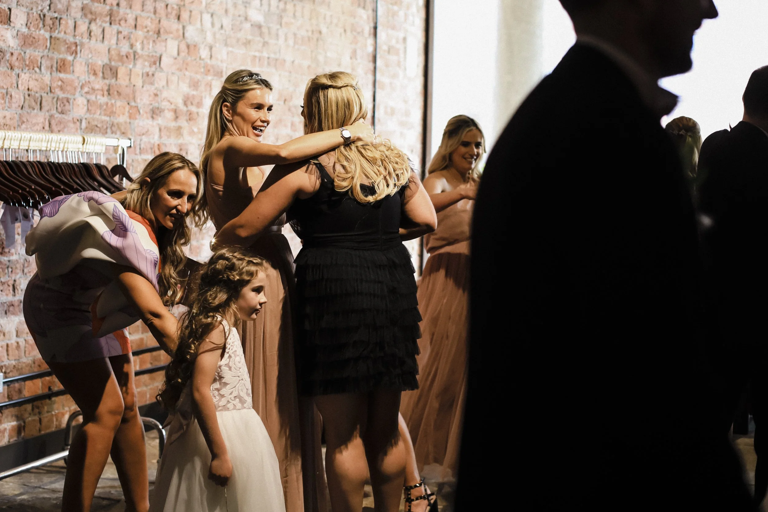 Authentic Moments: Candid Shot Captures Guests at Titanic Hotel, Reflecting the Genuine Emotions and Interactions of This Special Occasion.