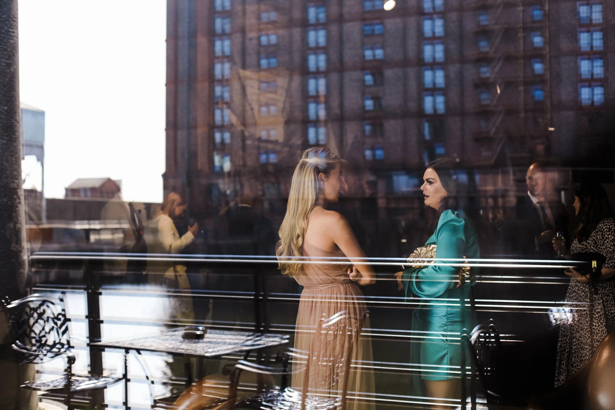 Authentic Moments: Candid Shot Captures Guests at Titanic Hotel, Reflecting the Genuine Emotions and Interactions of This Special Occasion.l 