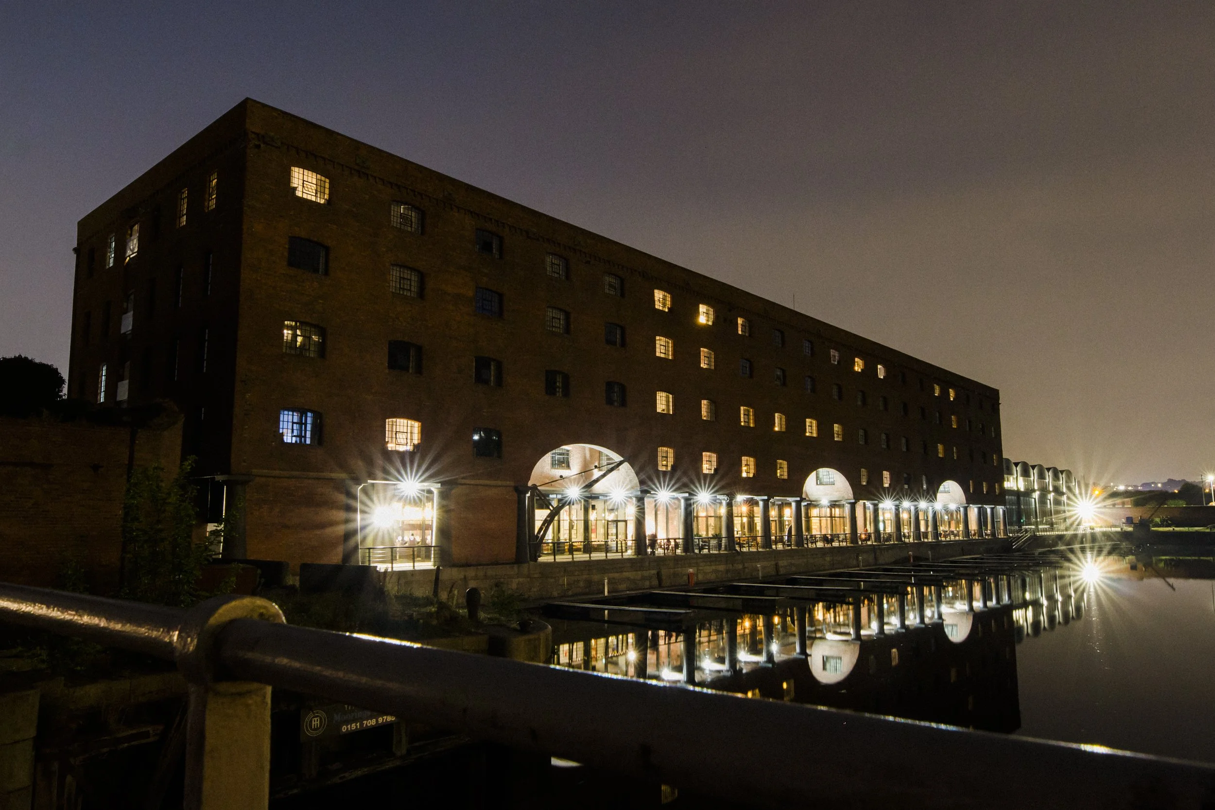 Energetic Celebration: A View of Titanic Hotel Liverpool Wedding at Night.