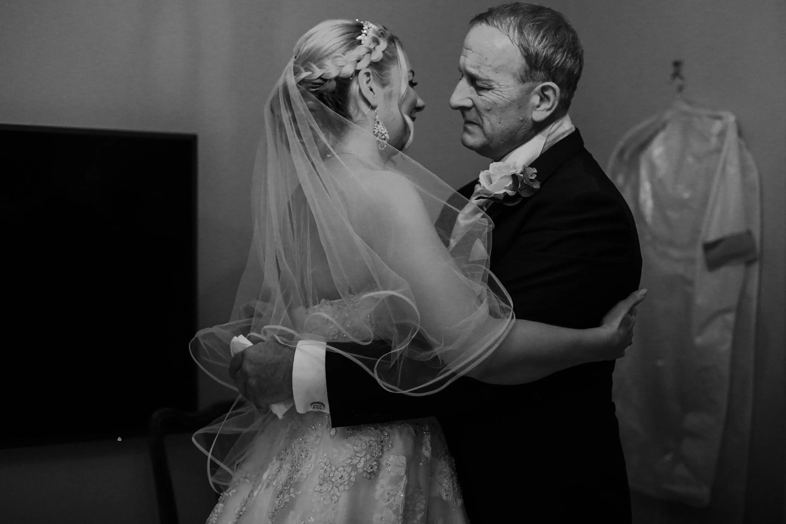 father of the bride seeing her for the first time that day Brook Hall wedding photographer 