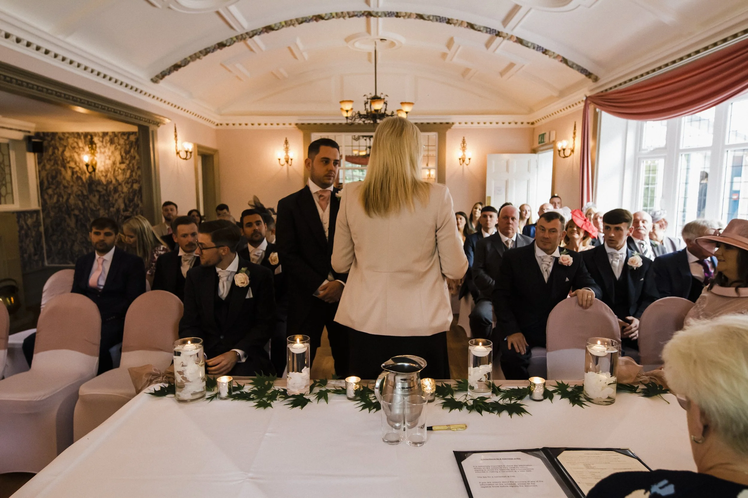 groom and guest awaiting the bride Brook Hall hotel wedding photography 