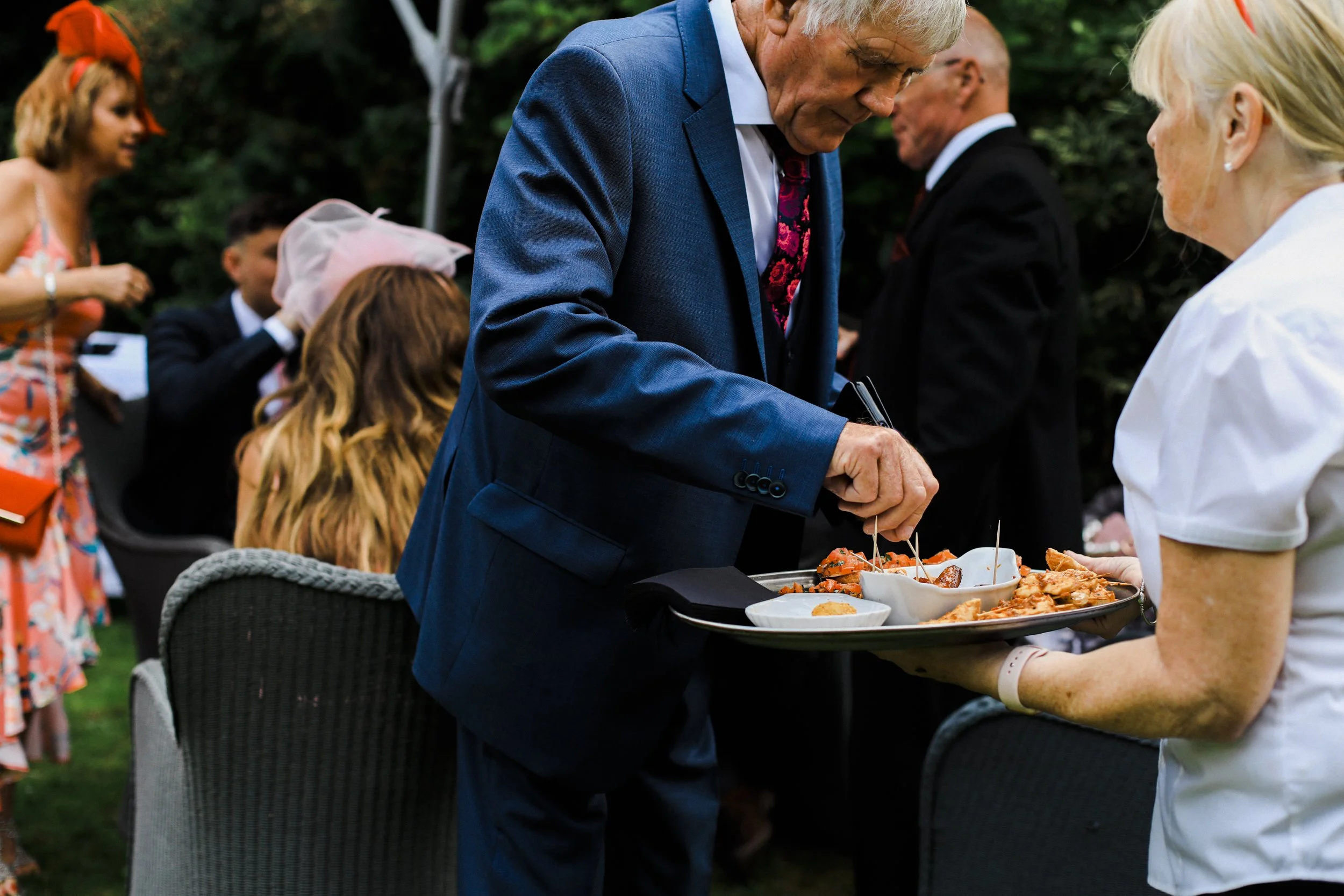 guests enjoying food Brook Hall hotel wedding photography