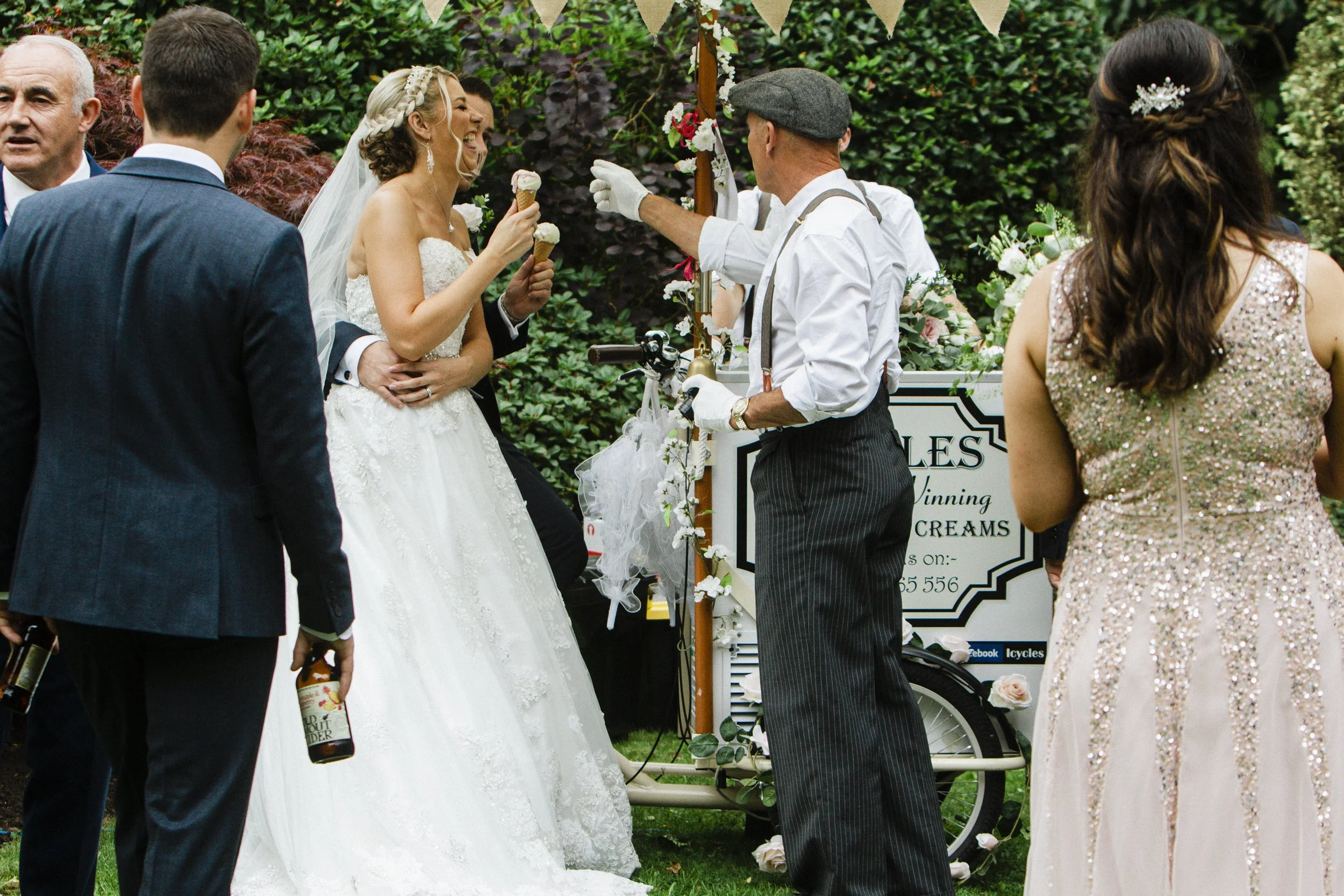 bride and groom laughing with ice cream Brook Hall hotel wedding photography