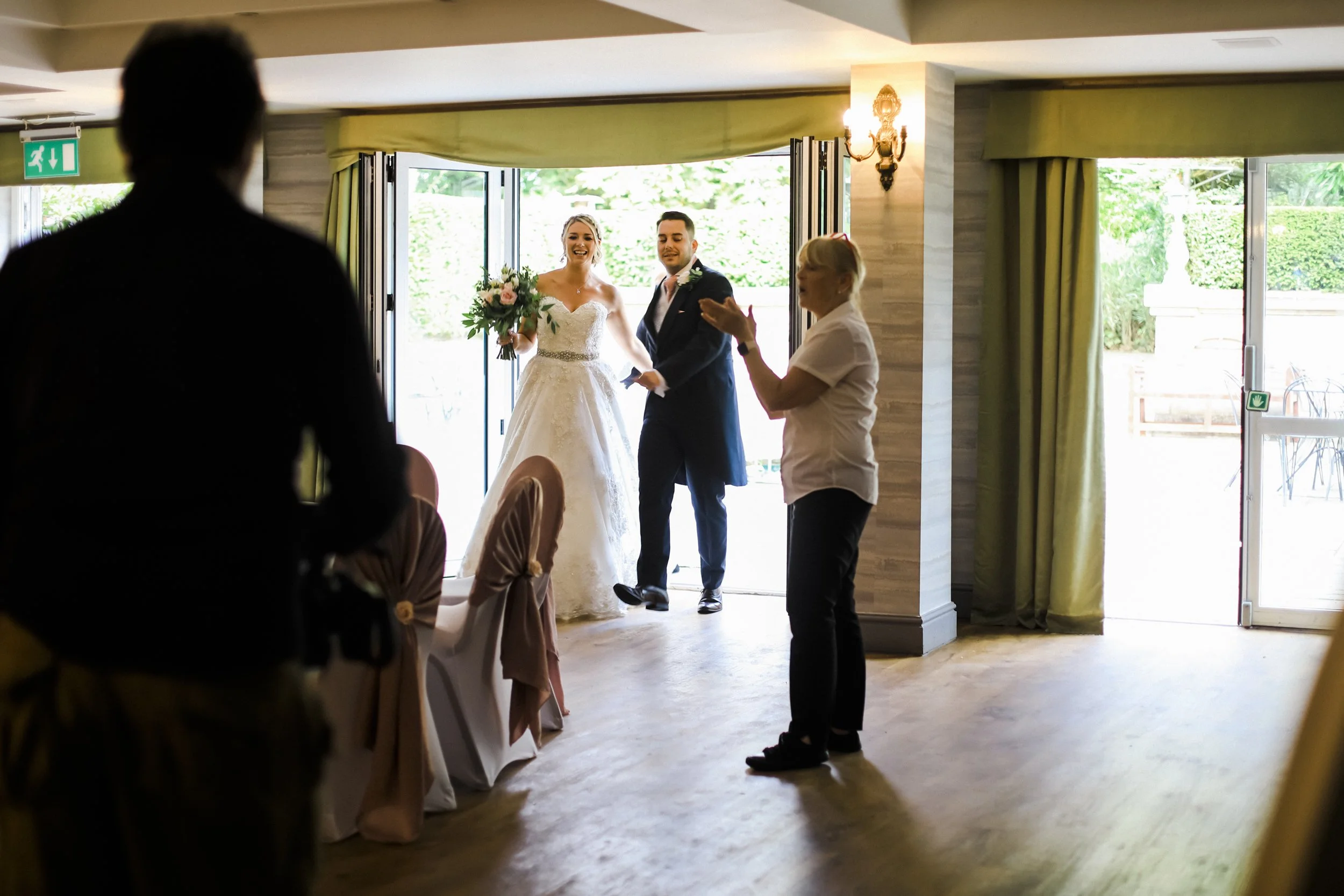 bride and groom announced for wedding breakfast Brook Hall hotel wedding photography 