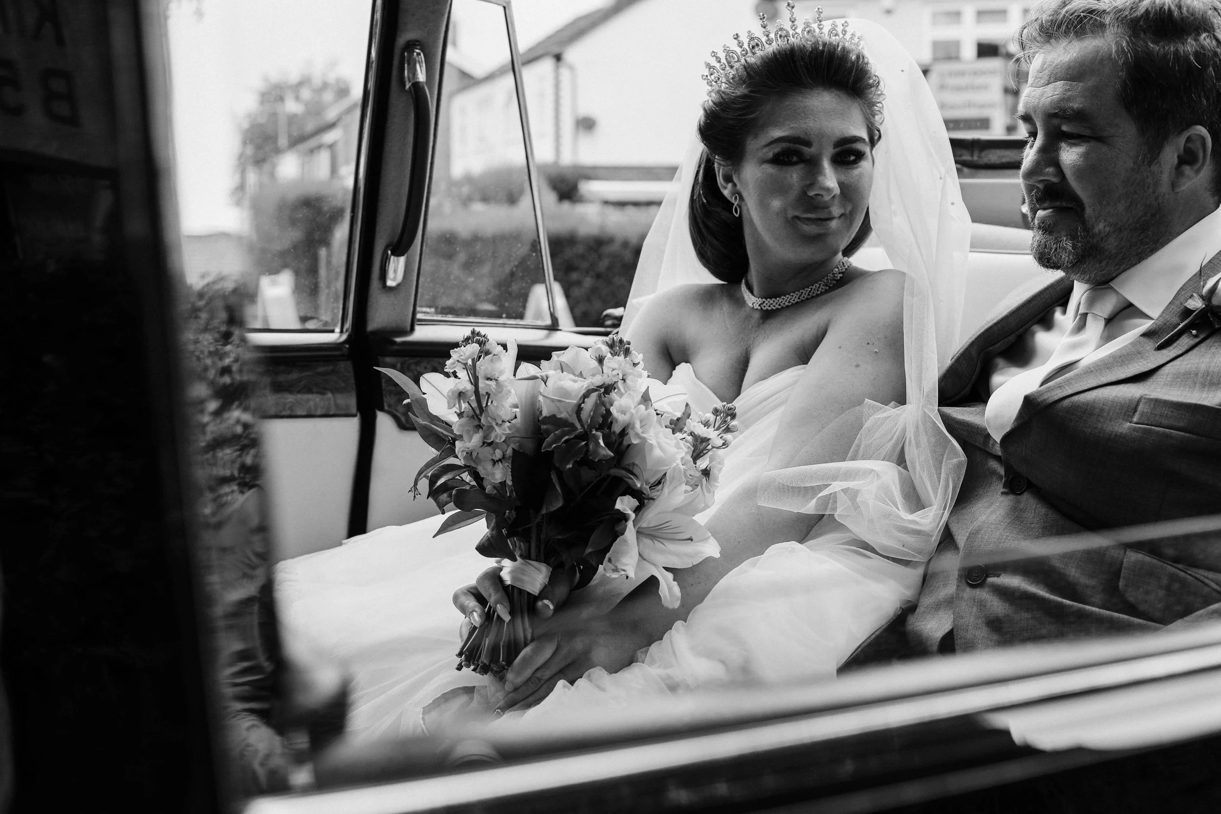 Bride Arrives in Style, Accompanied by Her Father, Adding a Touch of Grace to the Occasion.
