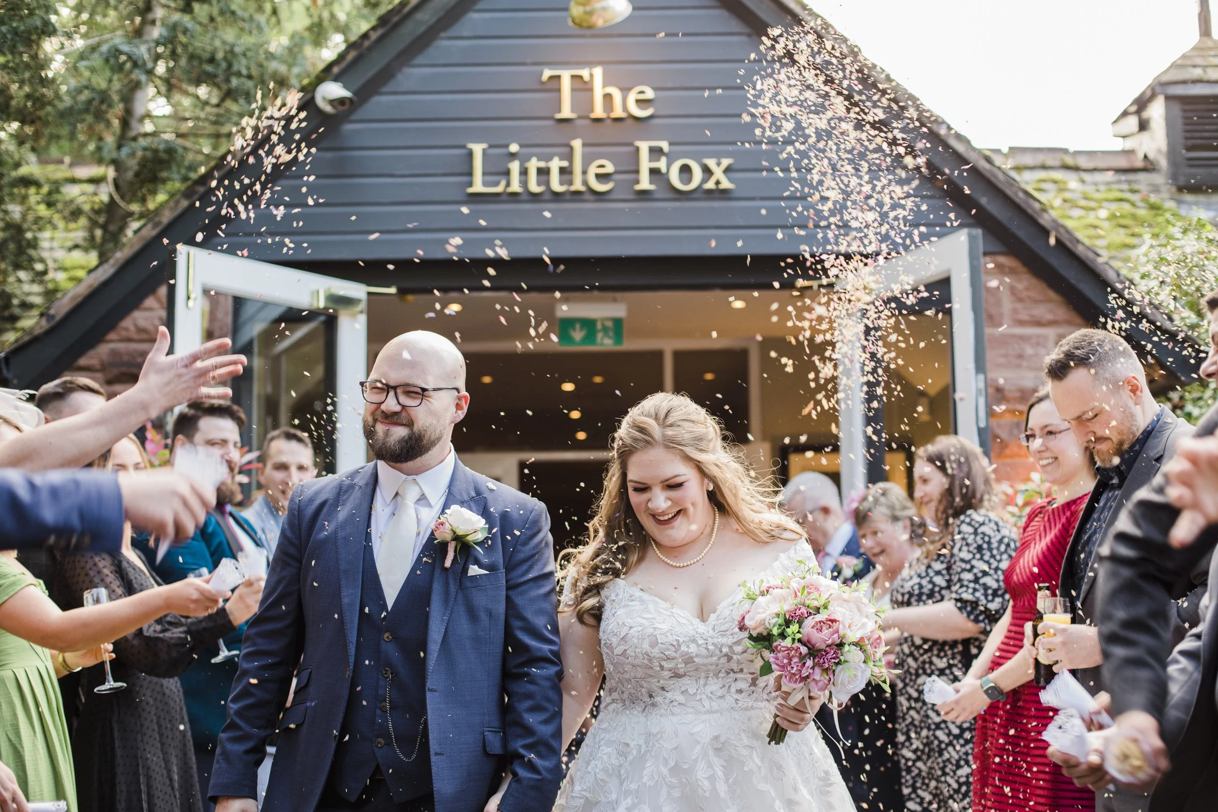 Exit from The Little Fox Wedding: Bride and Groom Showered in Confetti