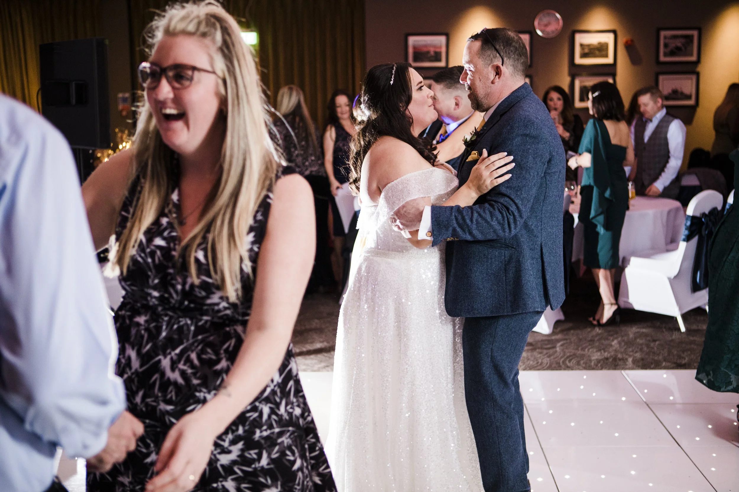 the party starts as guests join the happy couple Wirral Winter Wedding at the Holiday inn Ellesmere port 